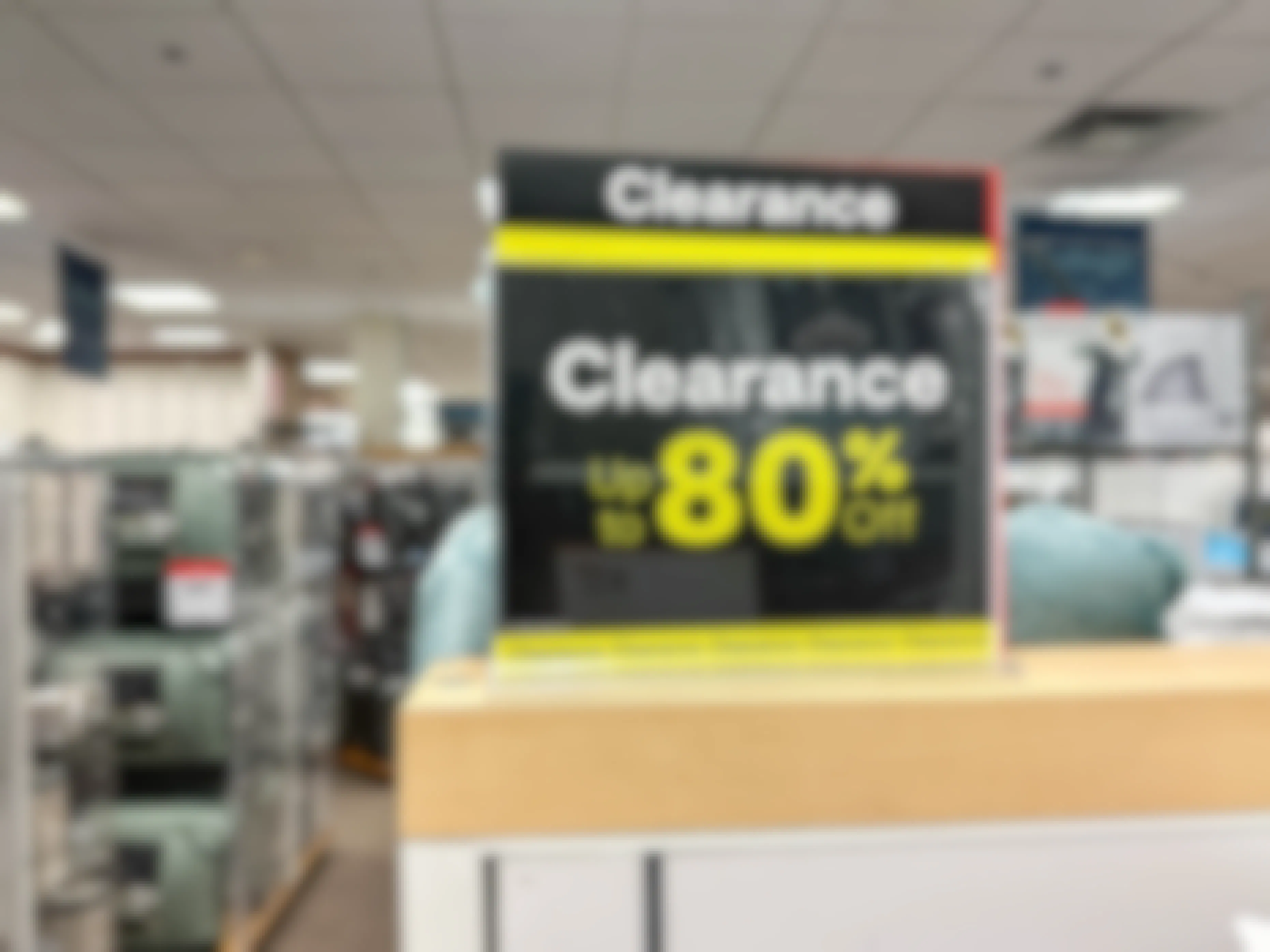 clearance sign with 80 percent off in jcpenneys store