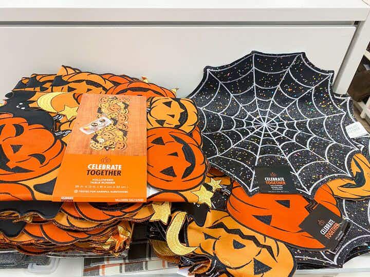 celebrate halloween together placemats on shelf