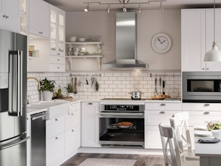 A kitchen with a wall-mounted range hood from IKEA