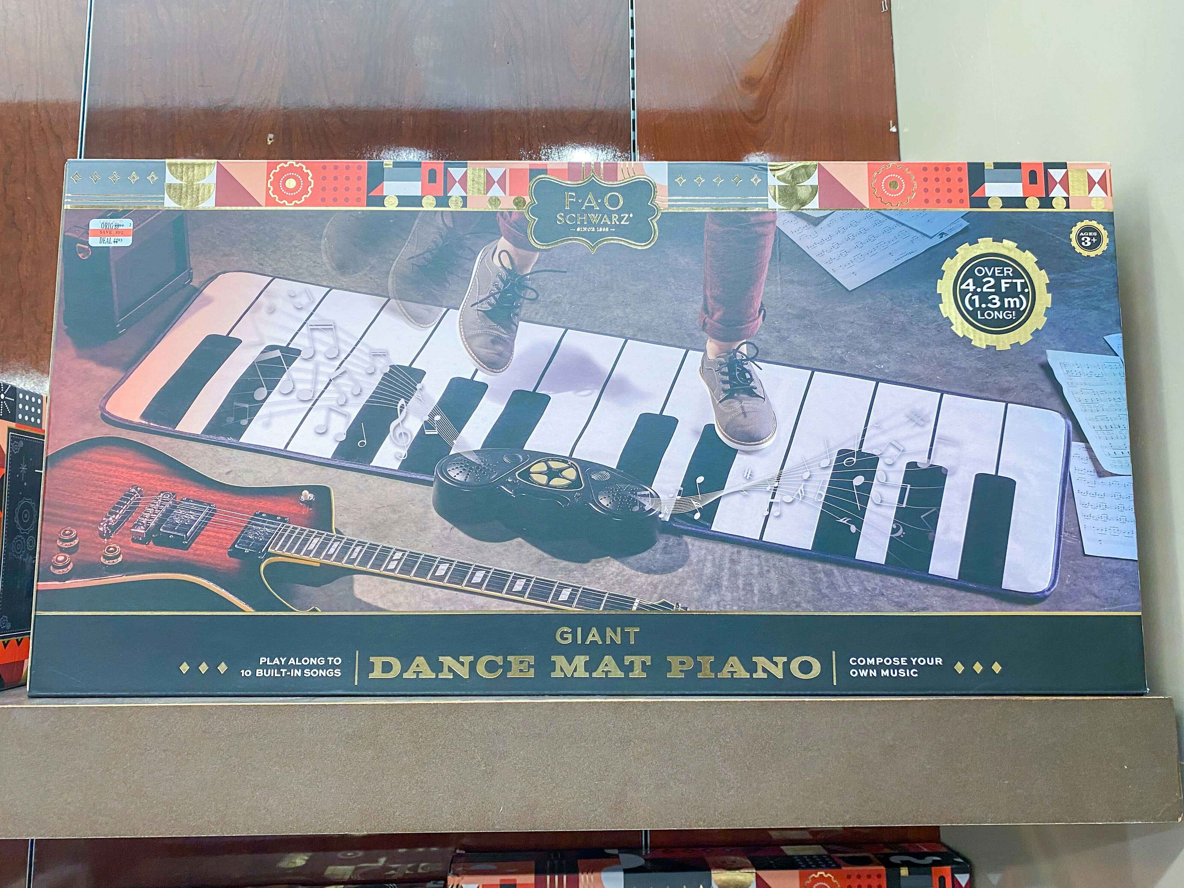 a dance piano mat in its box