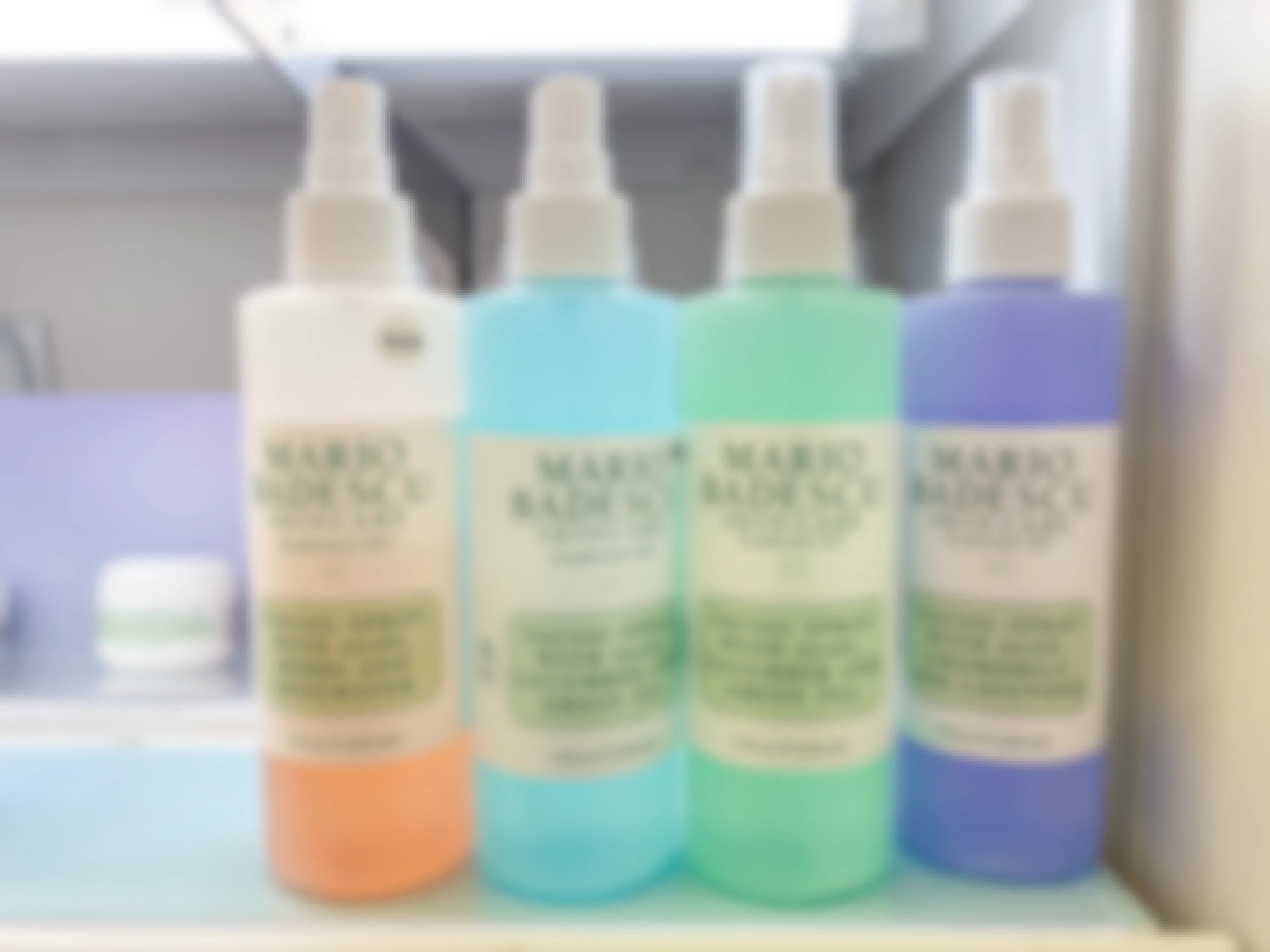 mario badescu facial sprays in different colors lined up