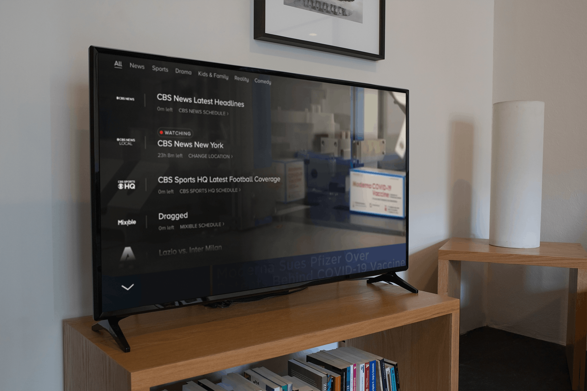 Smart tv on a wooden mookcase showing paramount plus