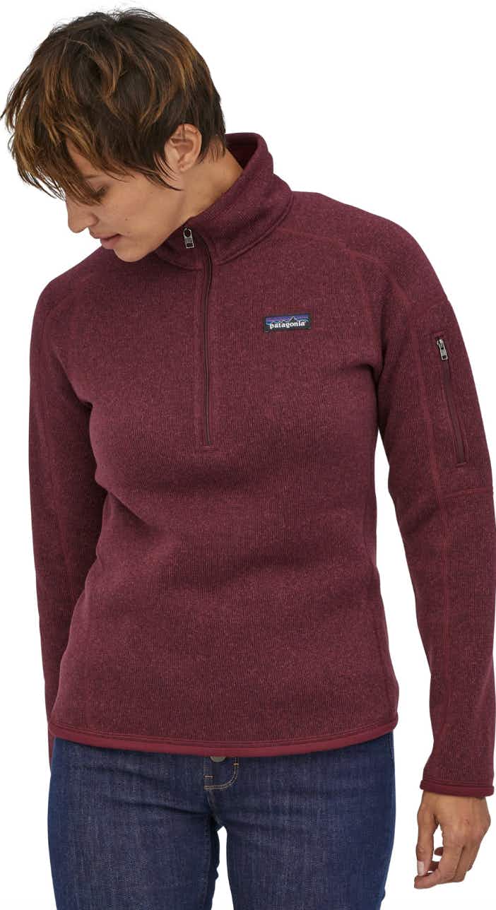 a woman wearing a red patagonia pullover 