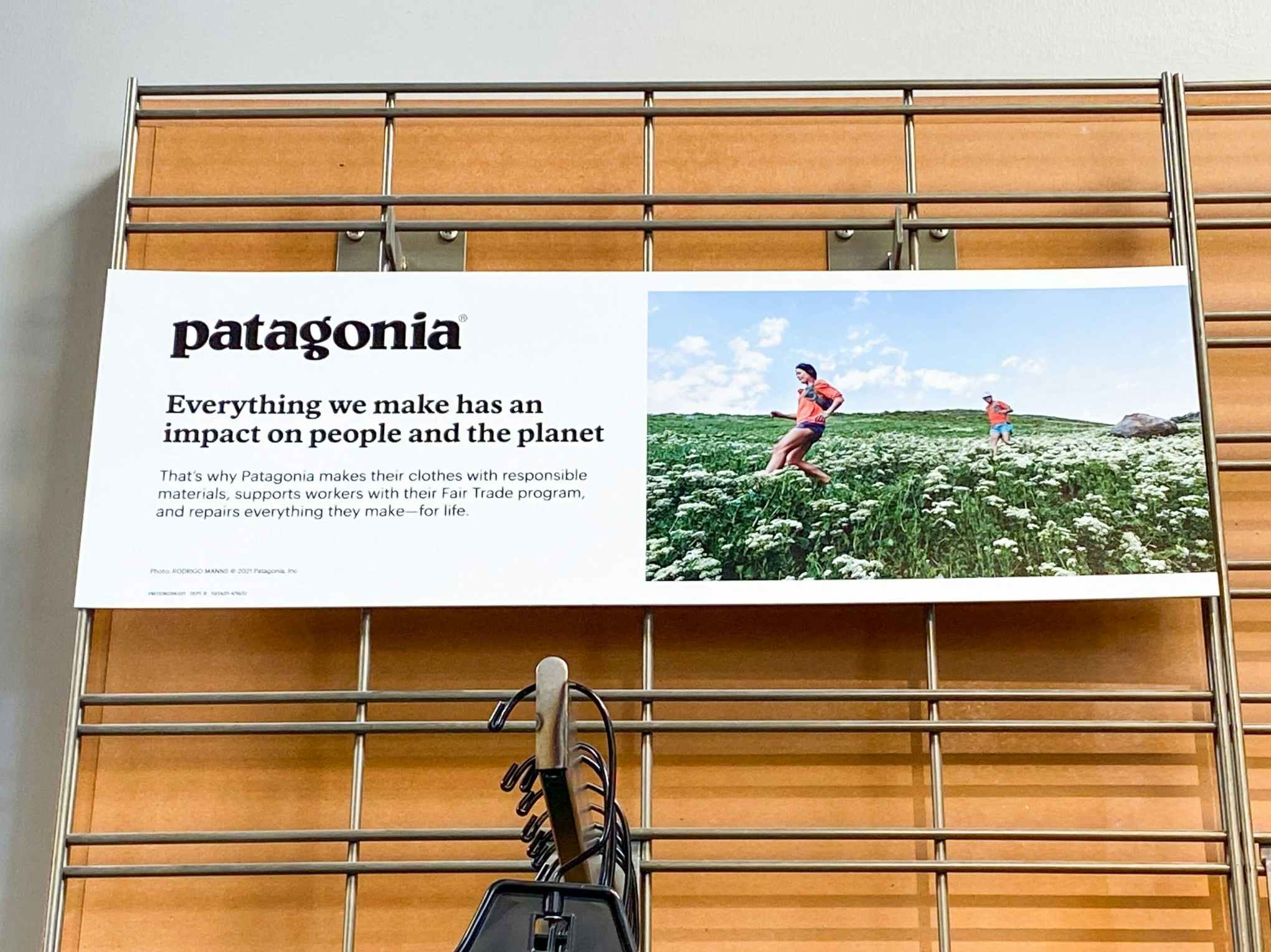 the patagonia mission statement on a sign inside REI
