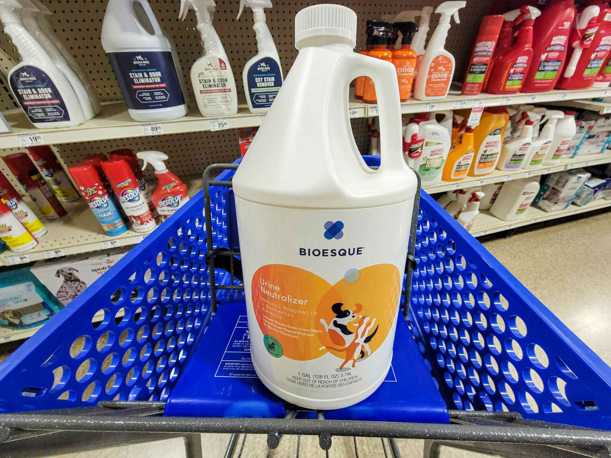 a gallon jug of bioesque urine neutralizer in a cart