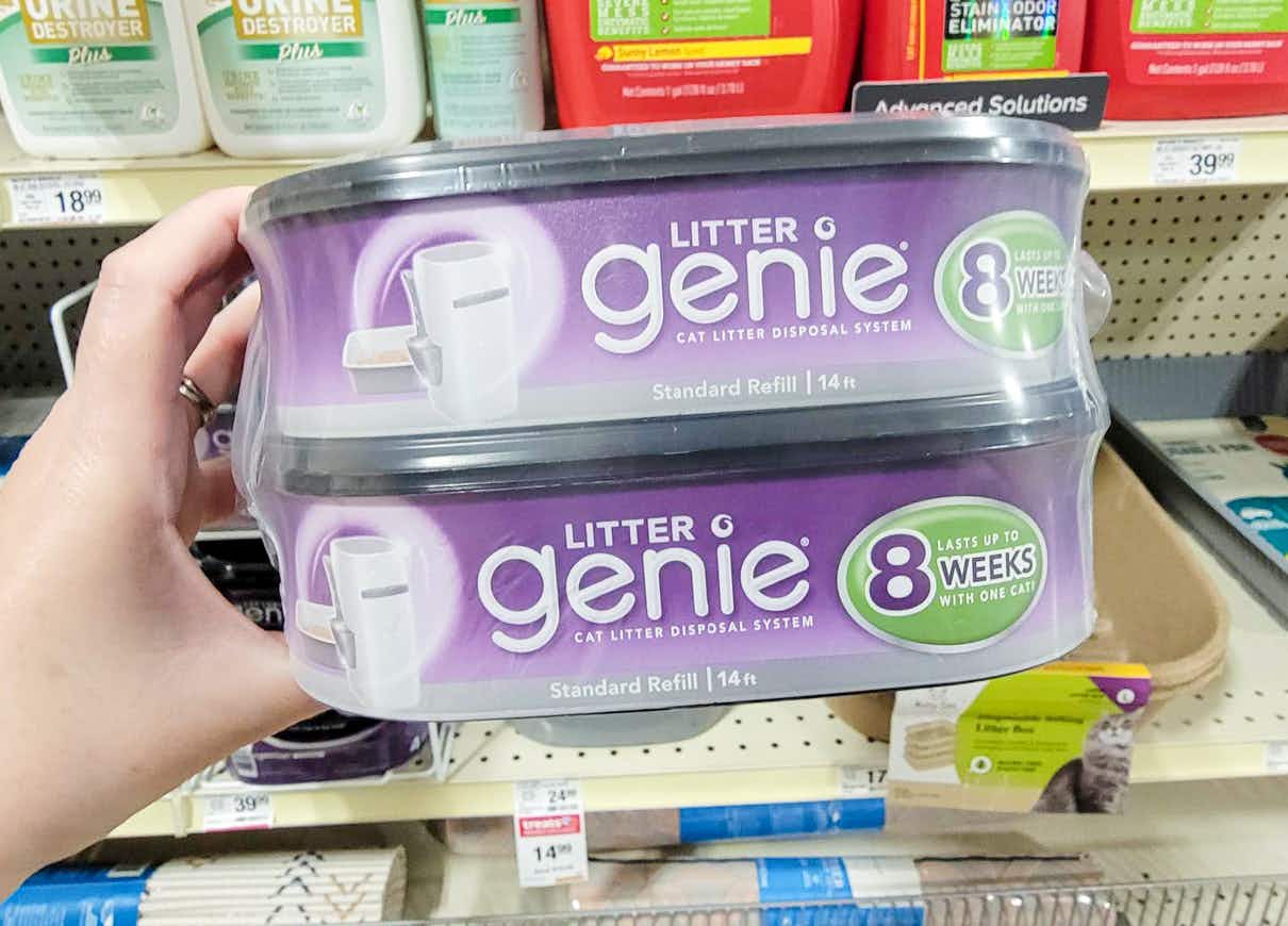 hand holding a 2 pack of litter genie refills