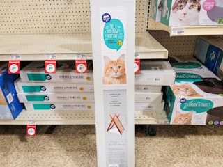 a box containing an a-frame cat bed