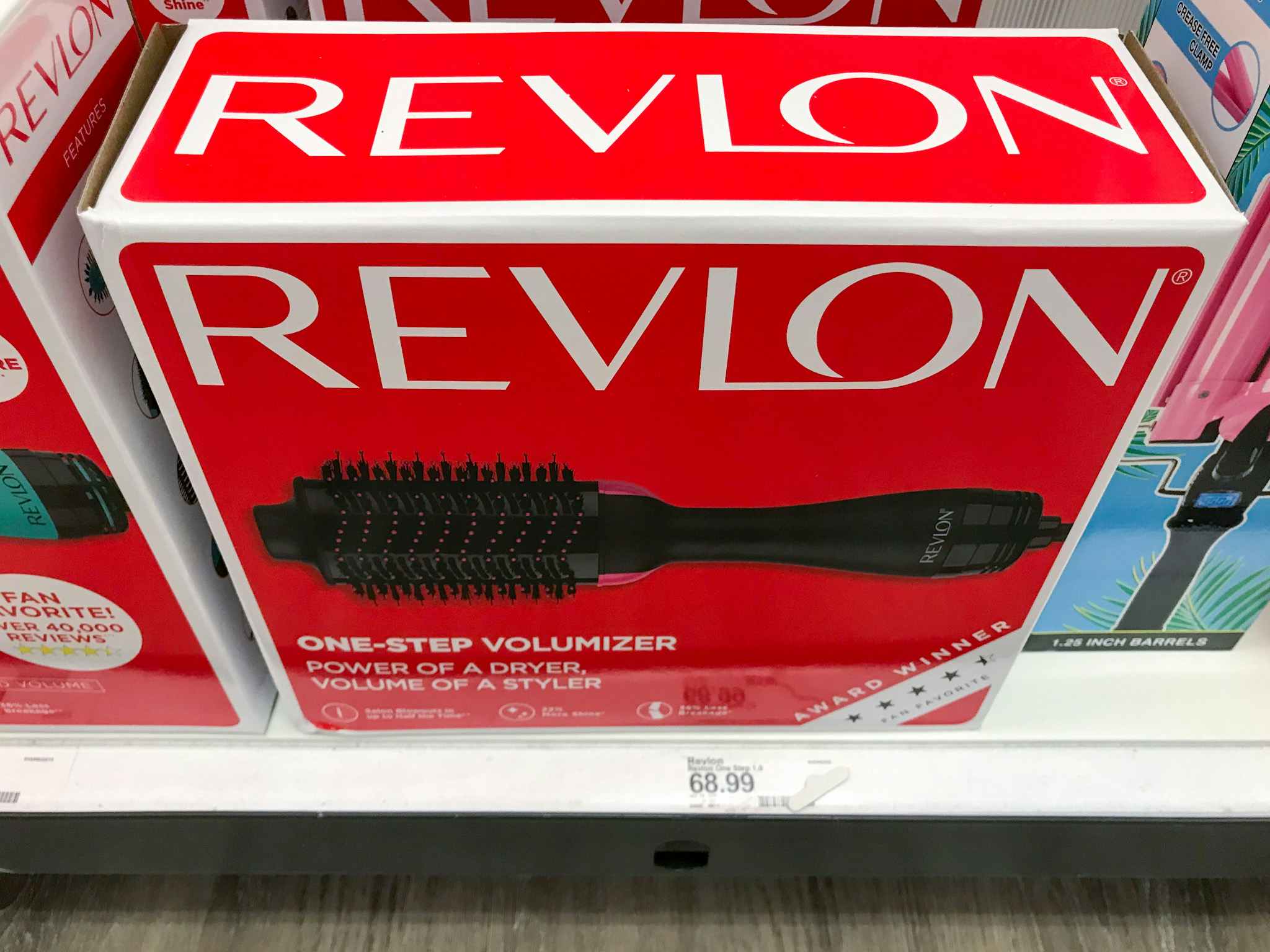 revlon one-step volumizer and hot air brush on a target shelf