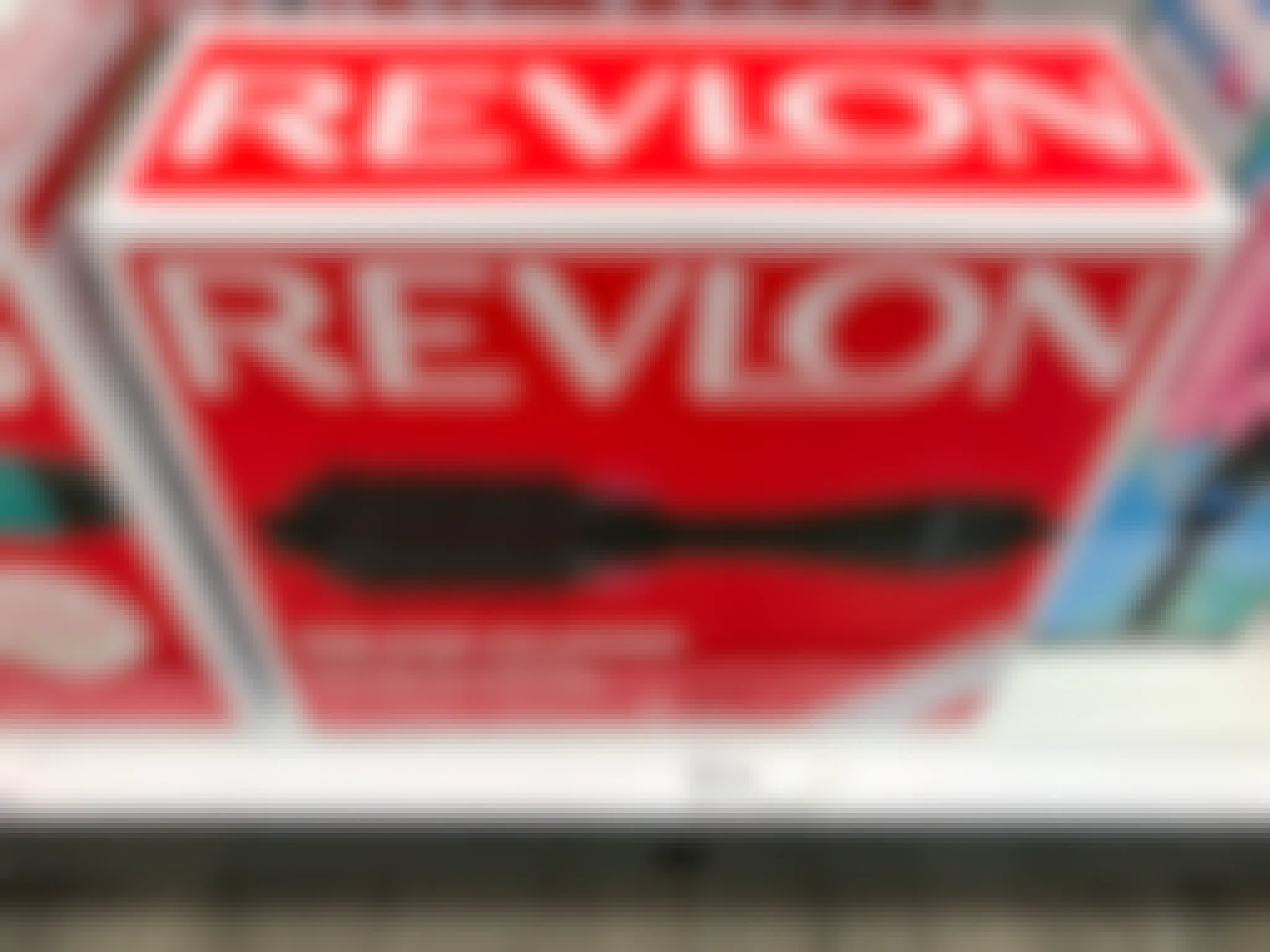 revlon one-step volumizer and hot air brush on a target shelf
