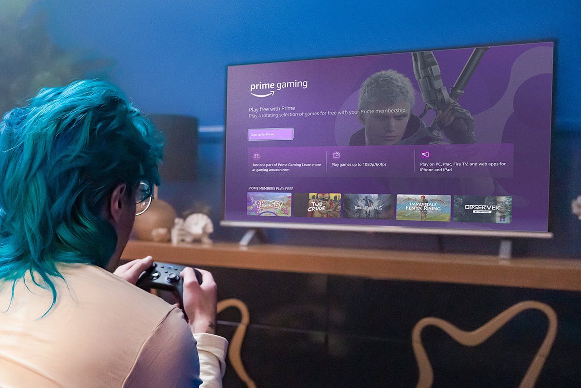 person playing games with Amazon Prime gaming on tv