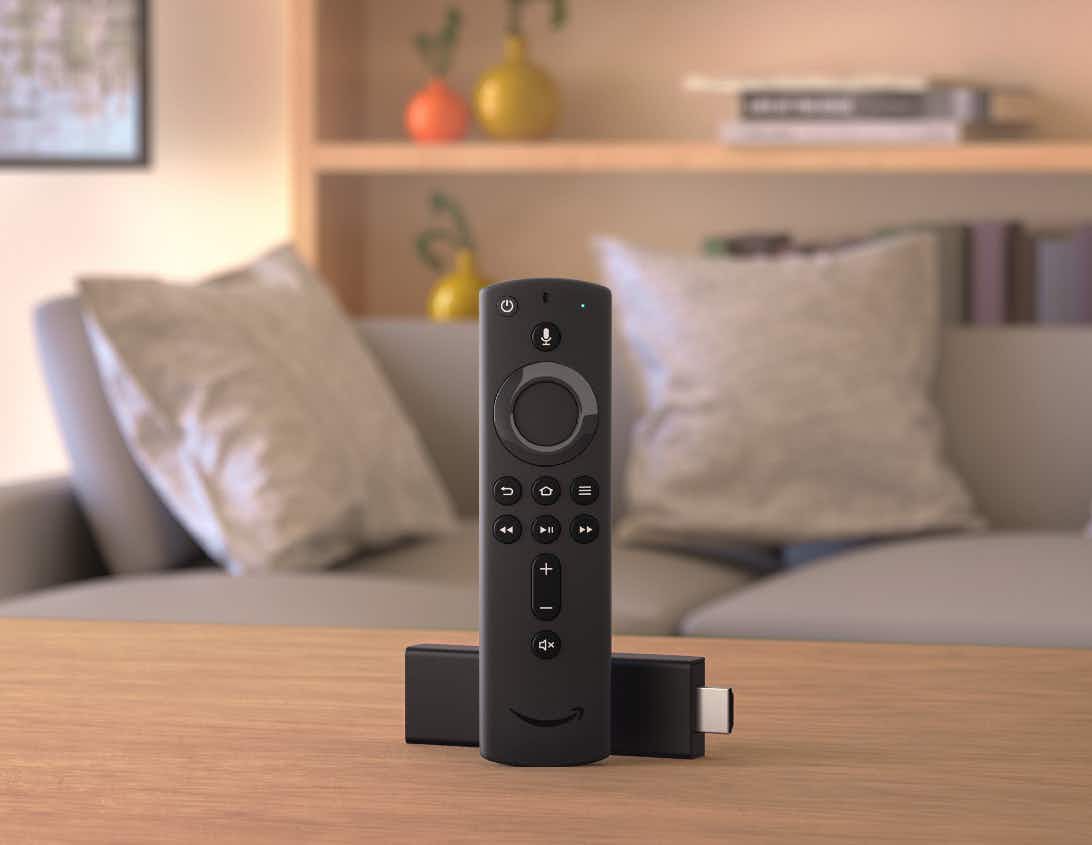 Amazon Fire Stick and remote on coffee table