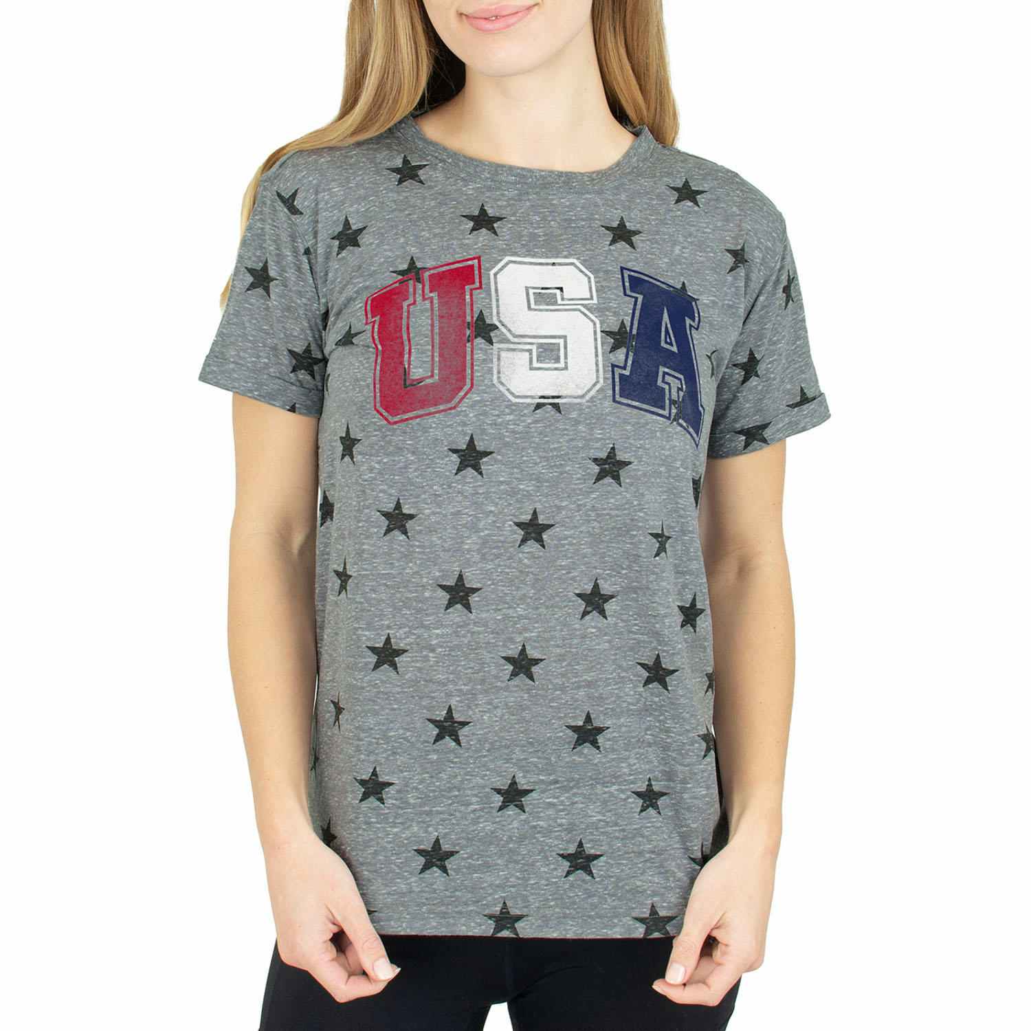 woman wearing a grey tee with stars that says usa