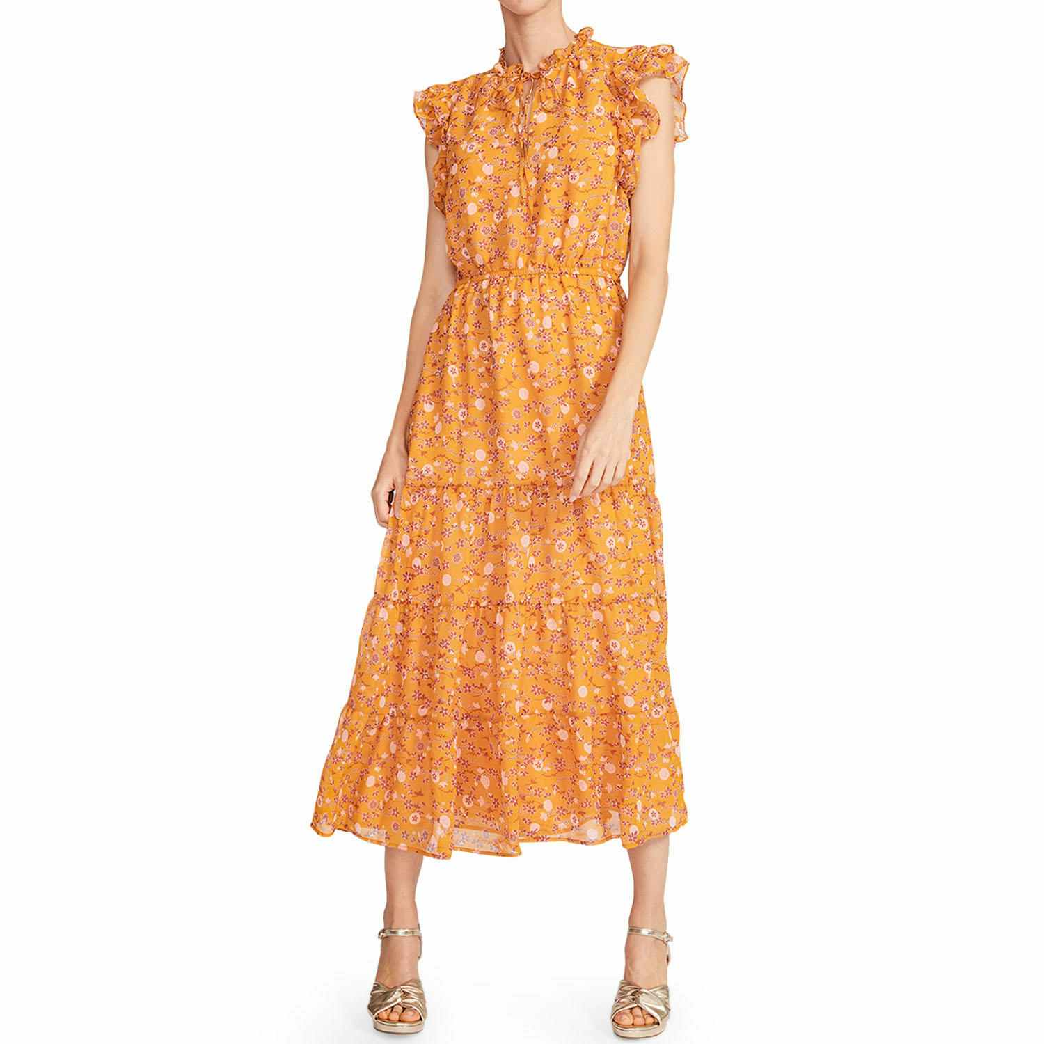 woman wearinga yellow dress with flowers