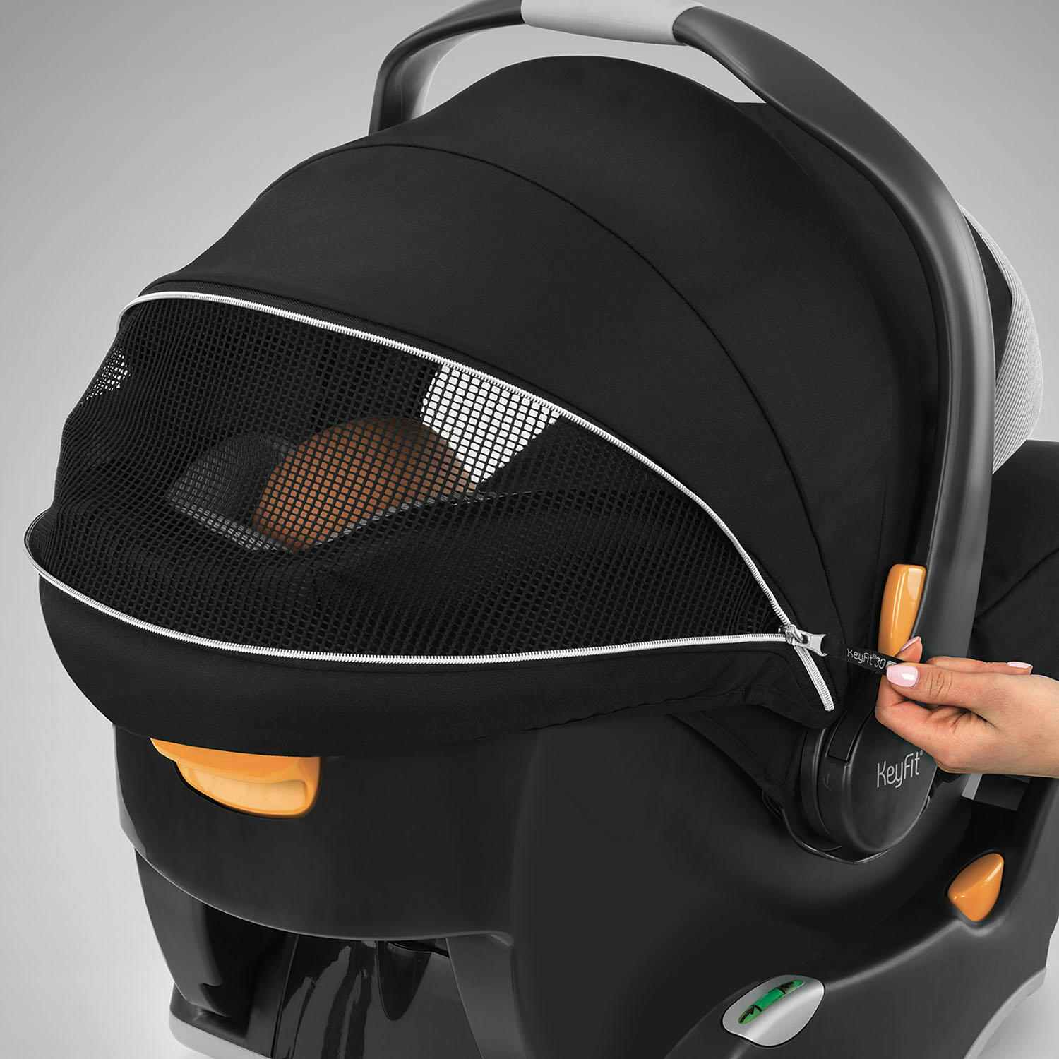 a chicco keyfit 30 infant car seat with a mesh breathable top that zips open