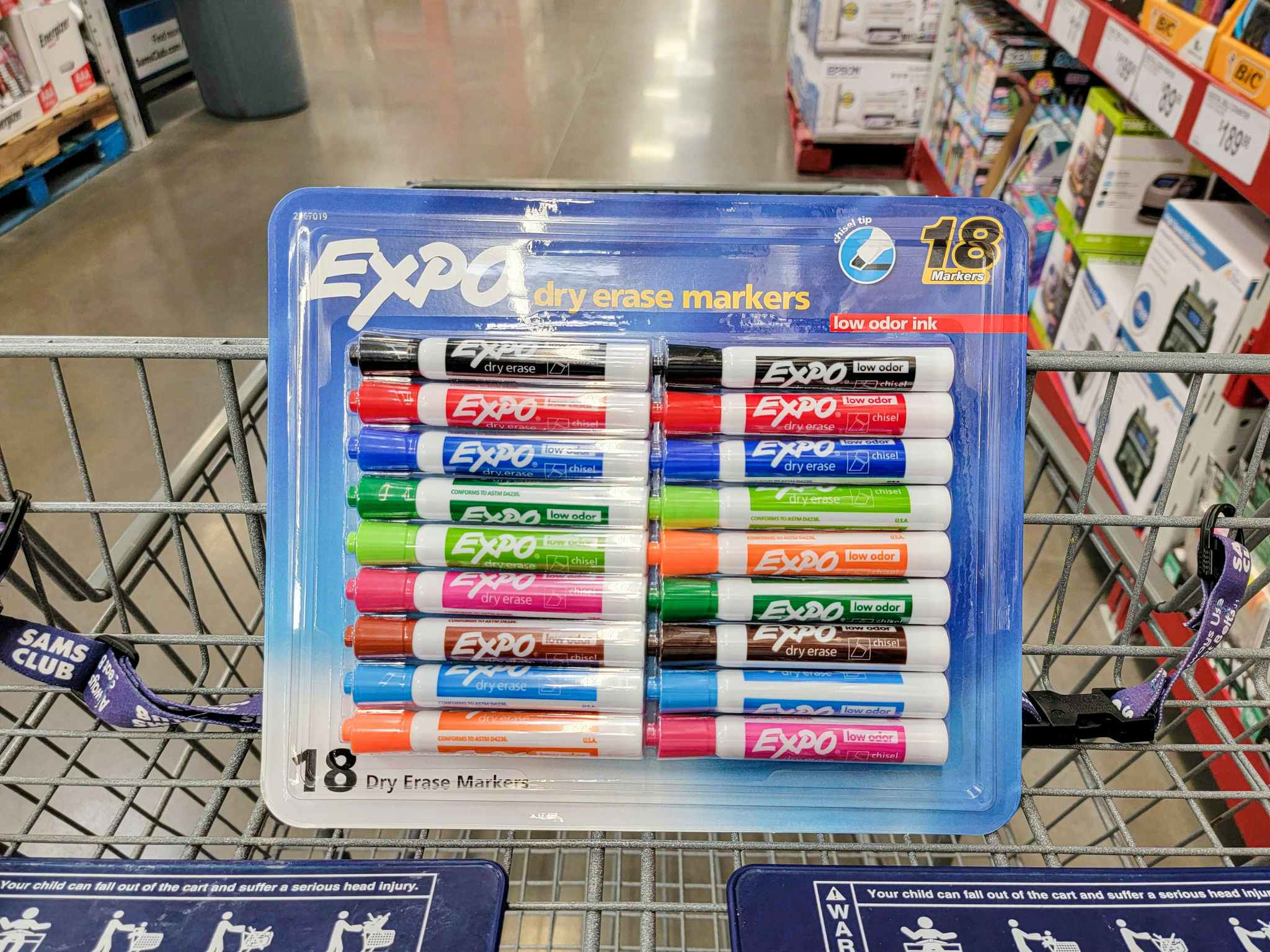 a variety 18 pack of expo markers in a cart