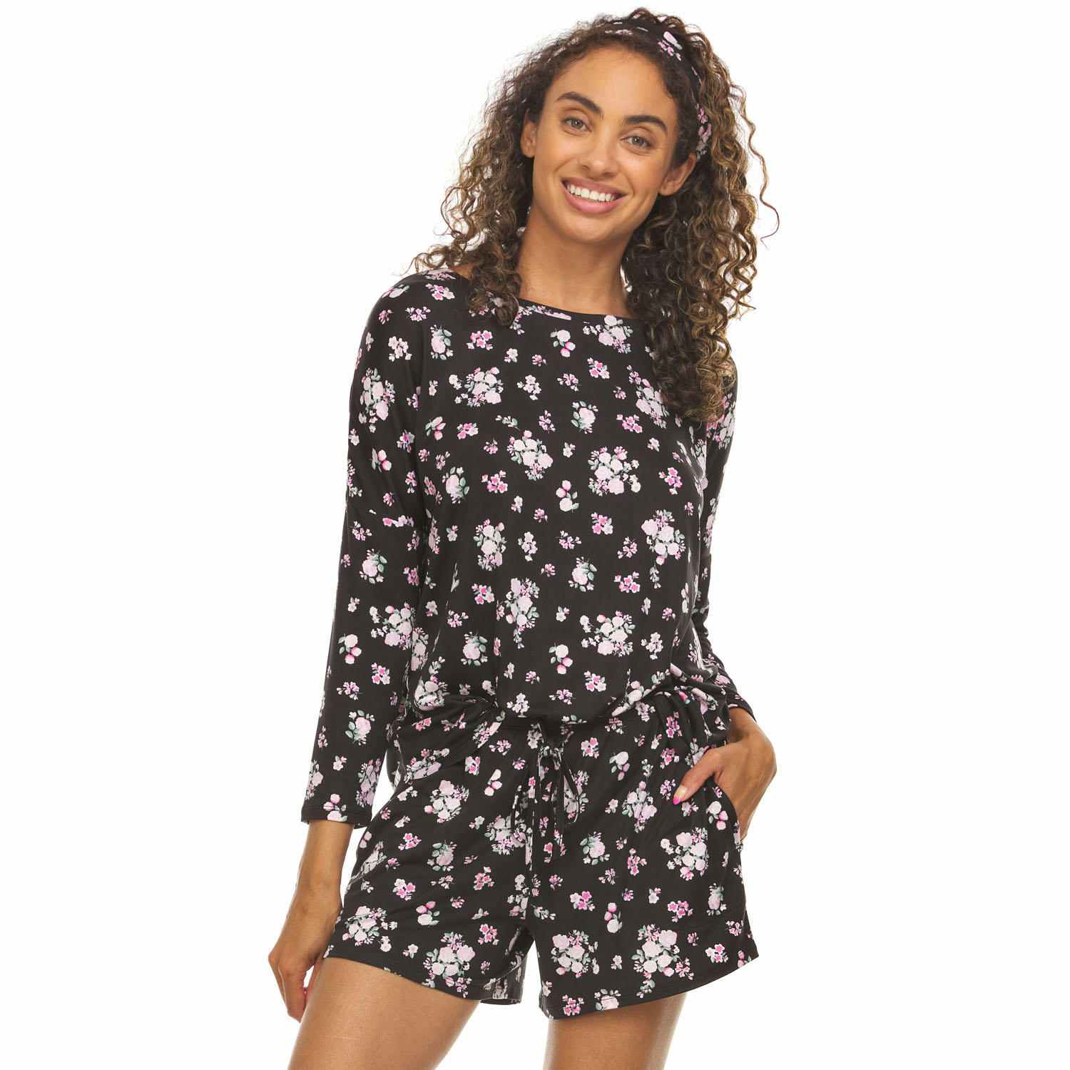 woman wearing a black floral pj set