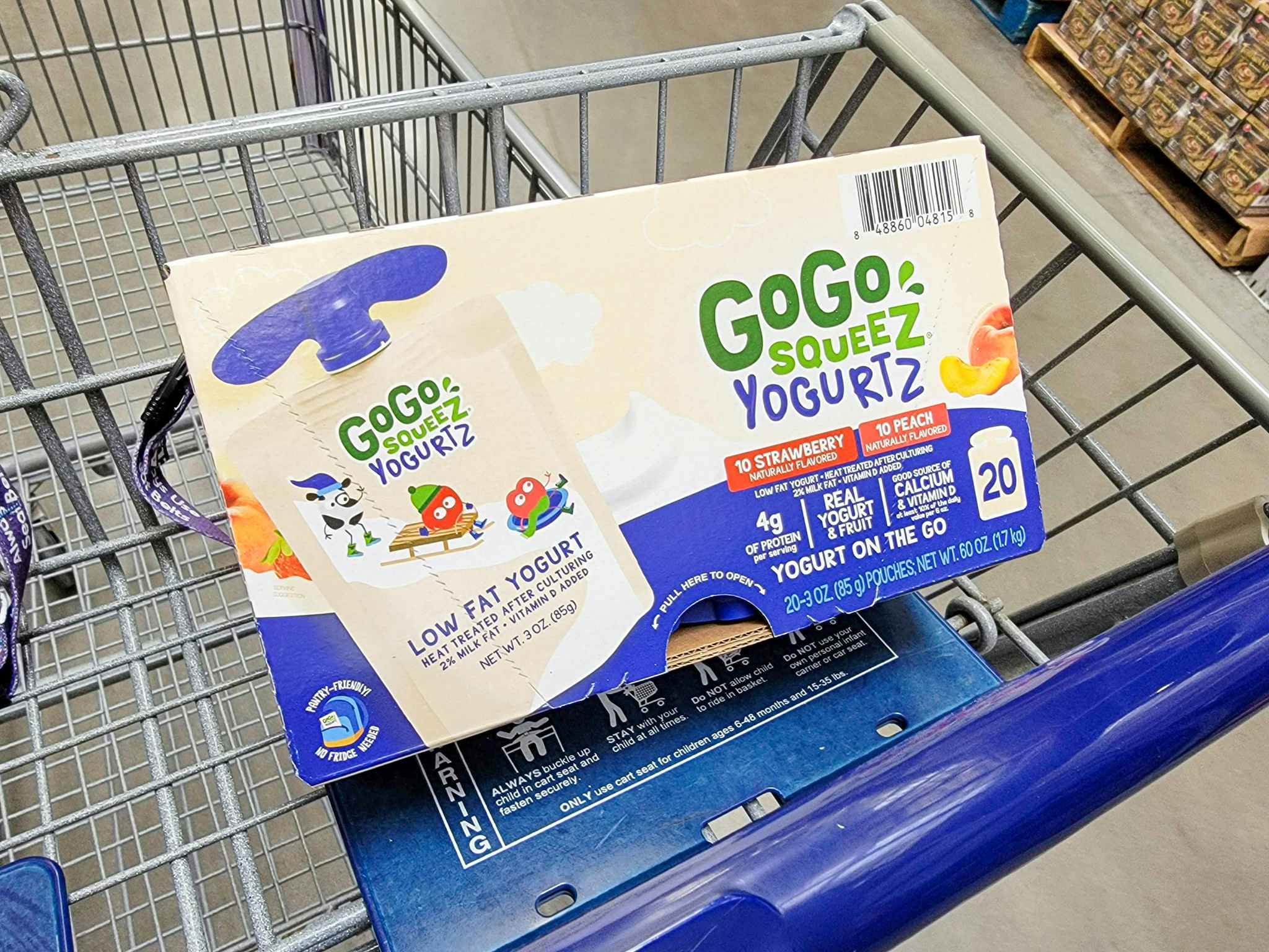 a box of gogo squeeze yogurt in a cart