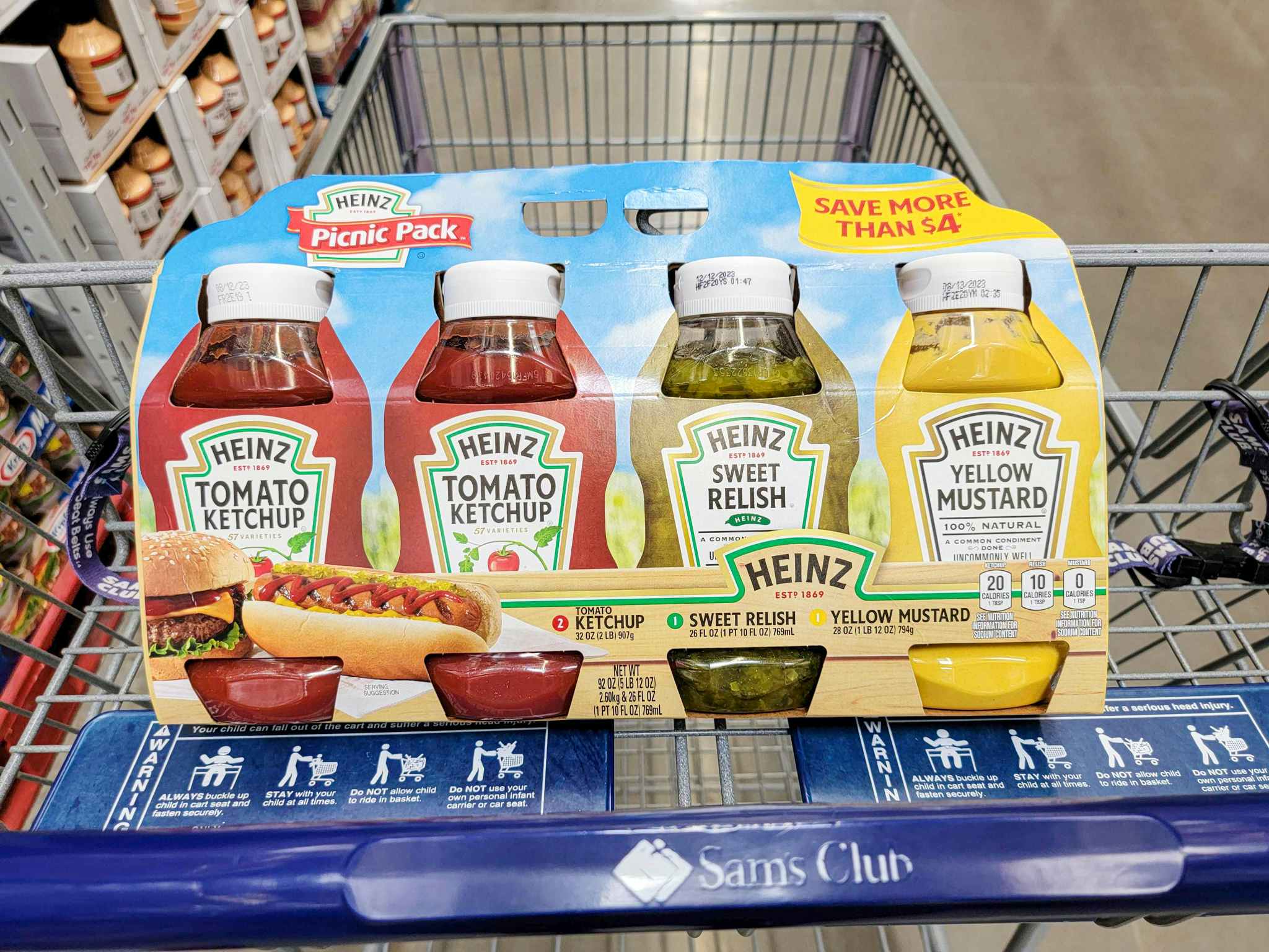 a pack of heinz condiments in a cart, with 2 bottles of ketchup, 1 relish, and 1 mustard