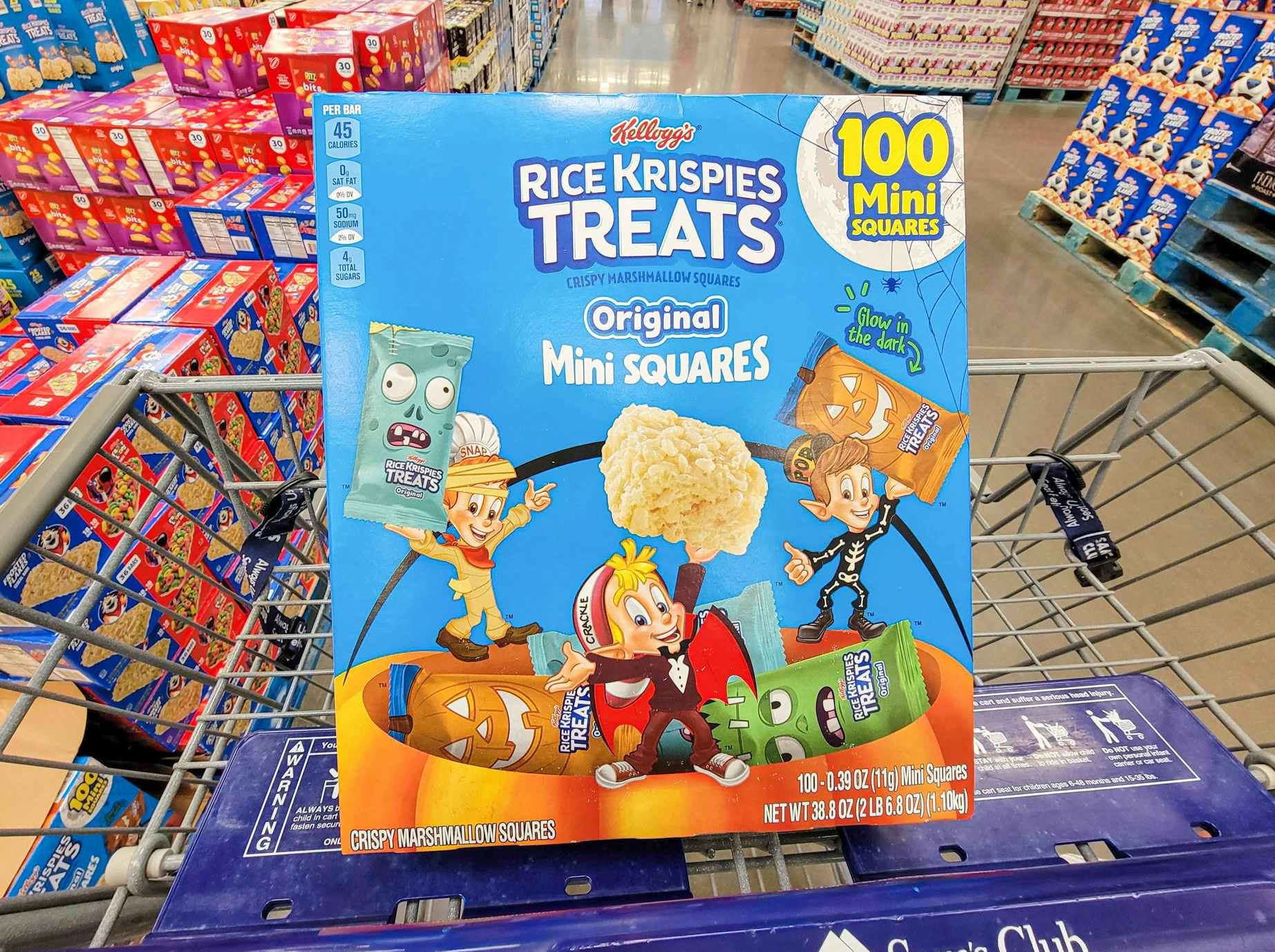 box of 100 mini rice krispie treats for halloween in a cart
