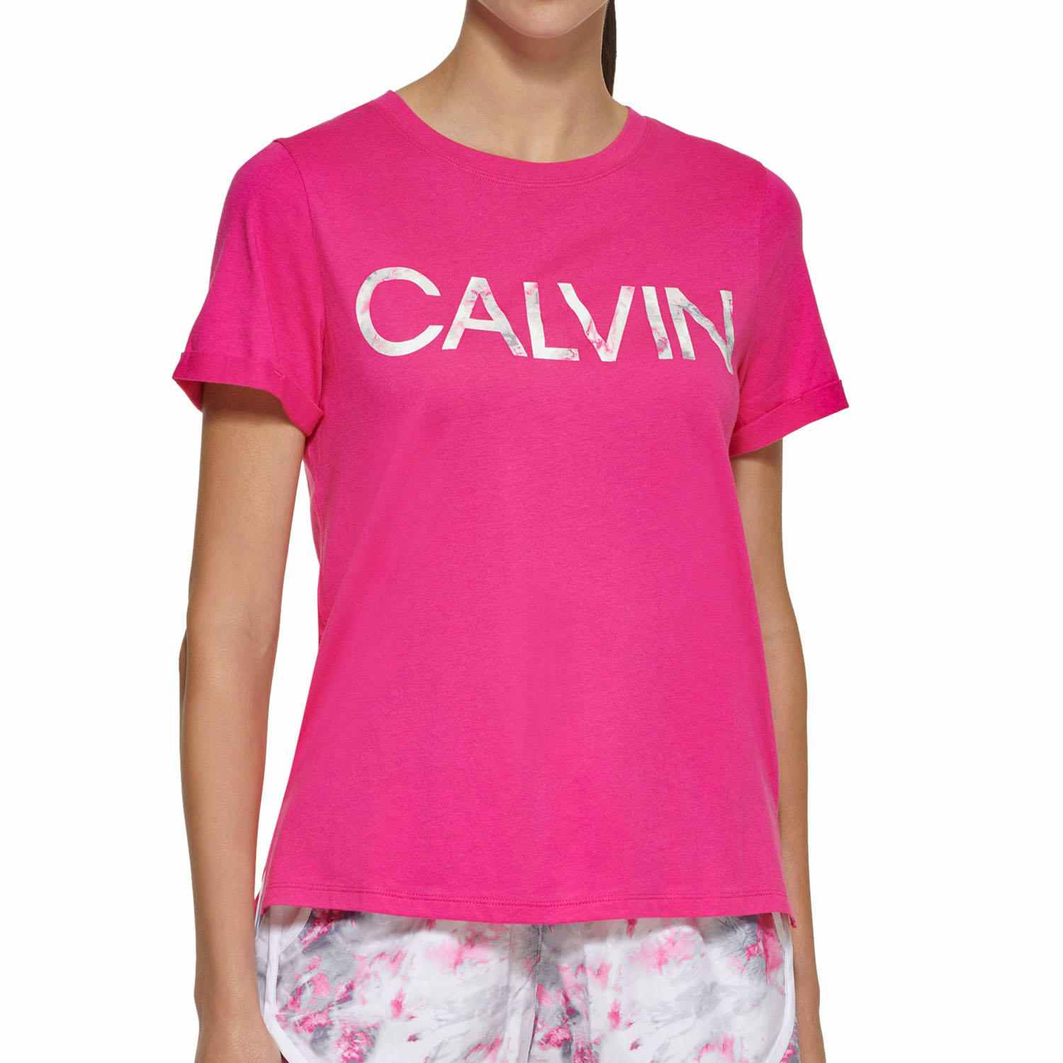 woman wearing a pink calvin klein tee