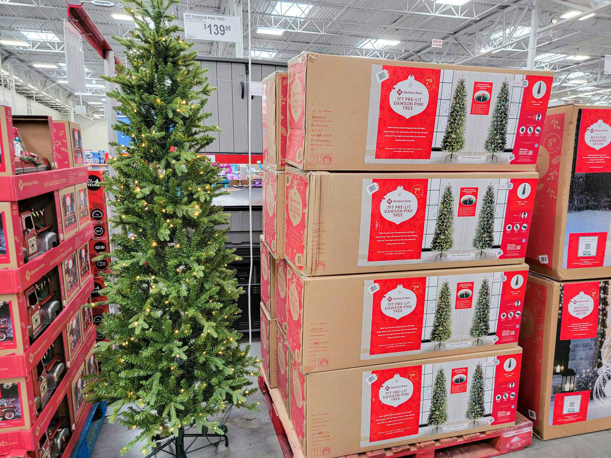 christmas tree displayed by boxes containing more trees