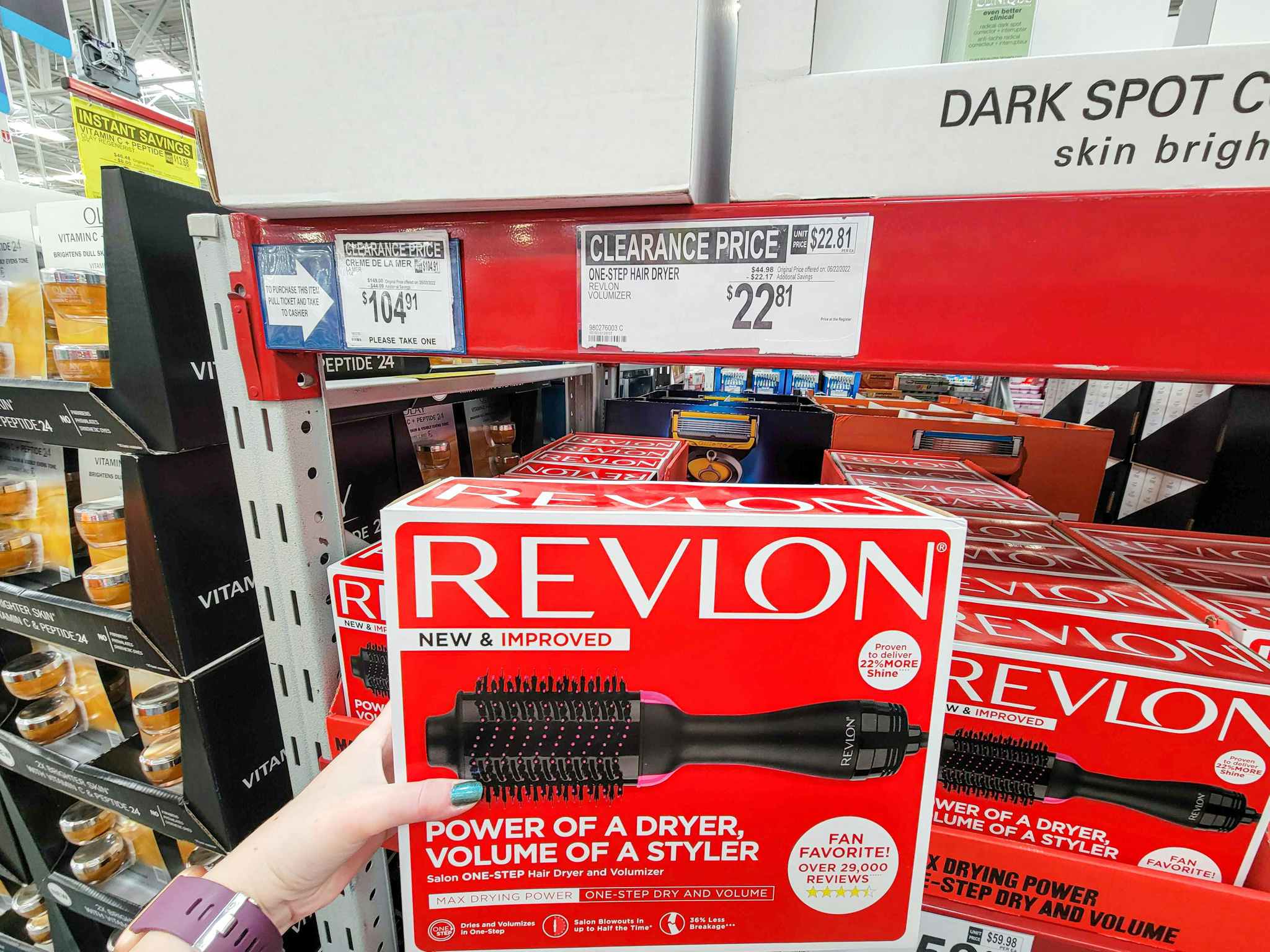 hand holding a revlon hair volumizer