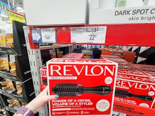 hand holding a revlon hair volumizer