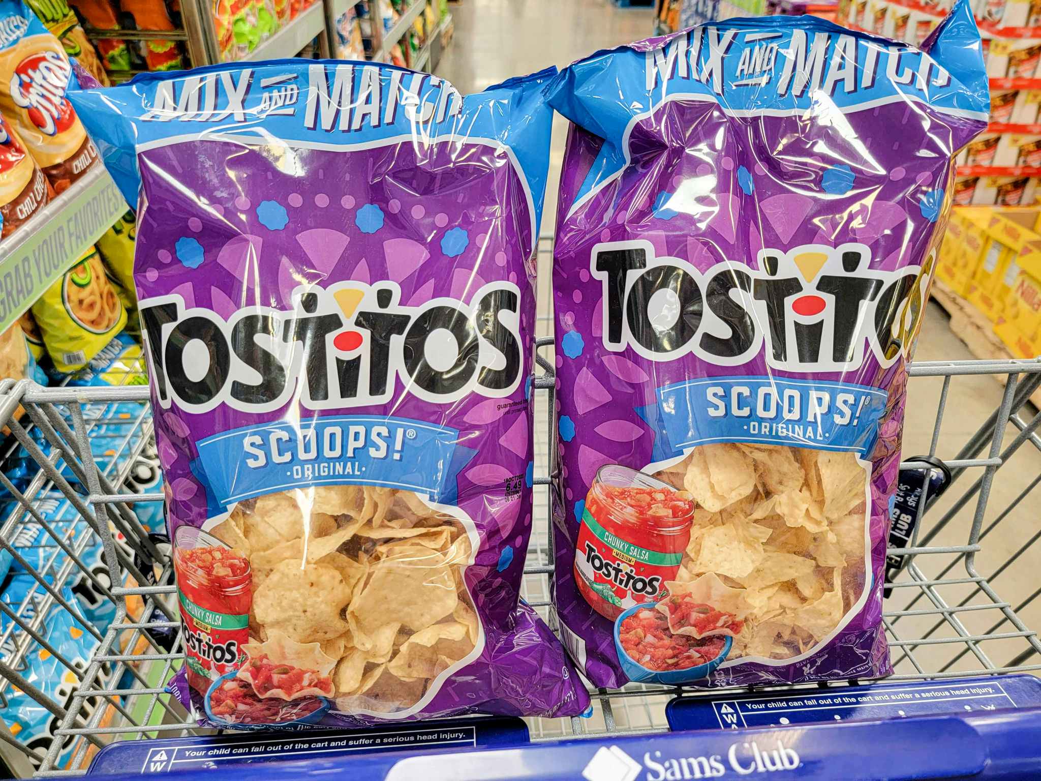 2 bags of tostitos scoops tortilla chips in a cart