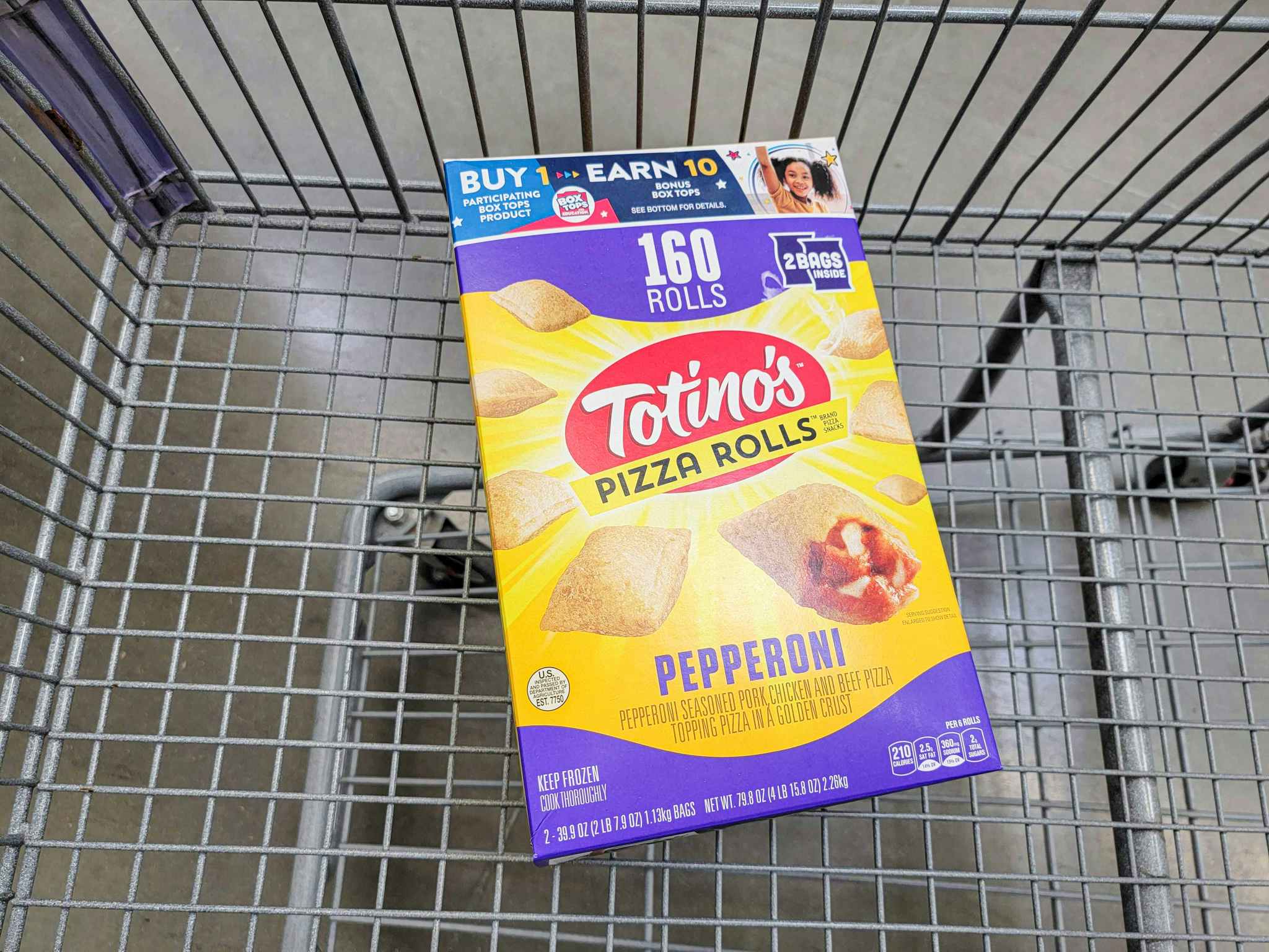 a box of 160 totinos pizza rolls in a cart