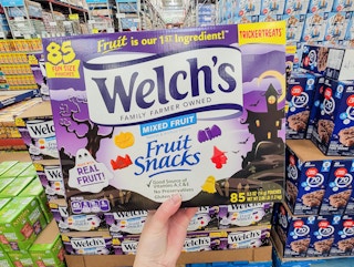 hand holding a box of 85 halloween themed welch's fruit snacks