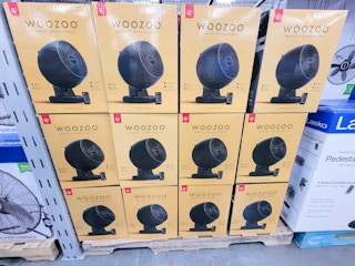 black remote controlled fans in boxes