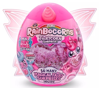 a pink rainbowcorn fairycorn surprise toy in a pink egg with wings