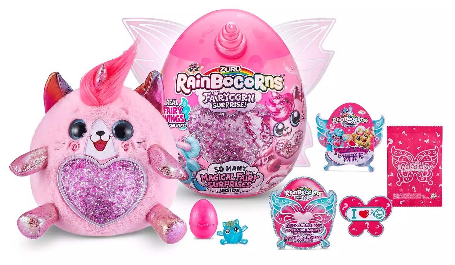a pink rainbowcorn fairycorn surprise toy opened to reveal the surprises