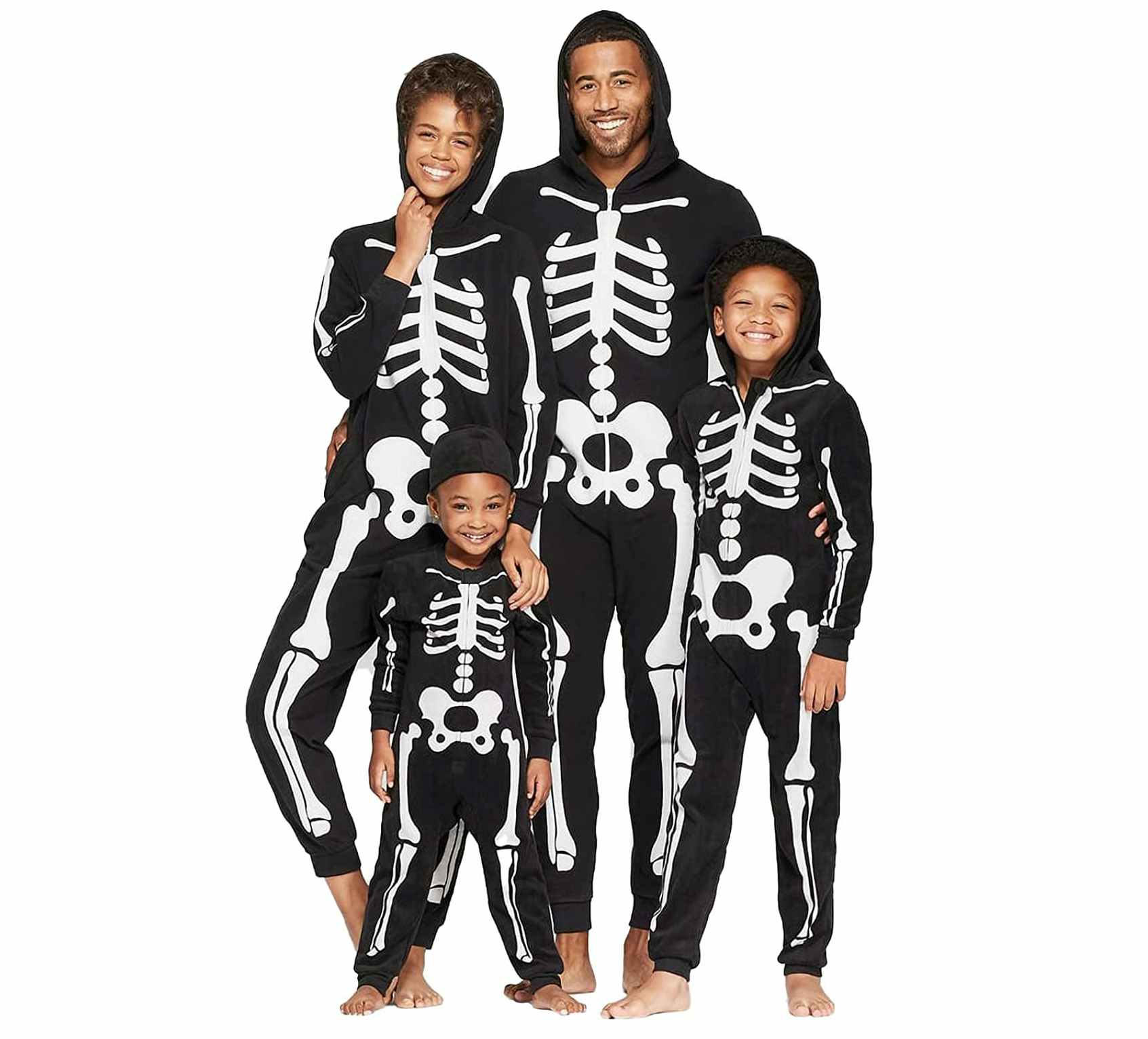 family dressed up in skeleton Halloween costumes
