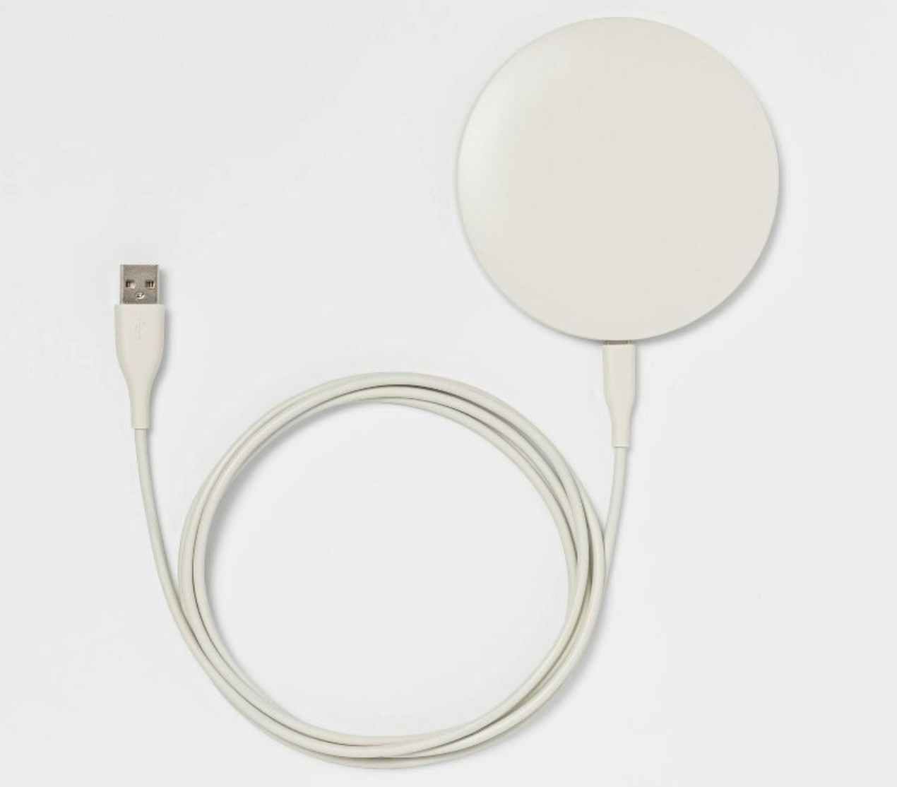 stock photo of a white phone charging puck from Target