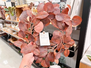 Hearth and Hand fall red leaf wreath held by hand