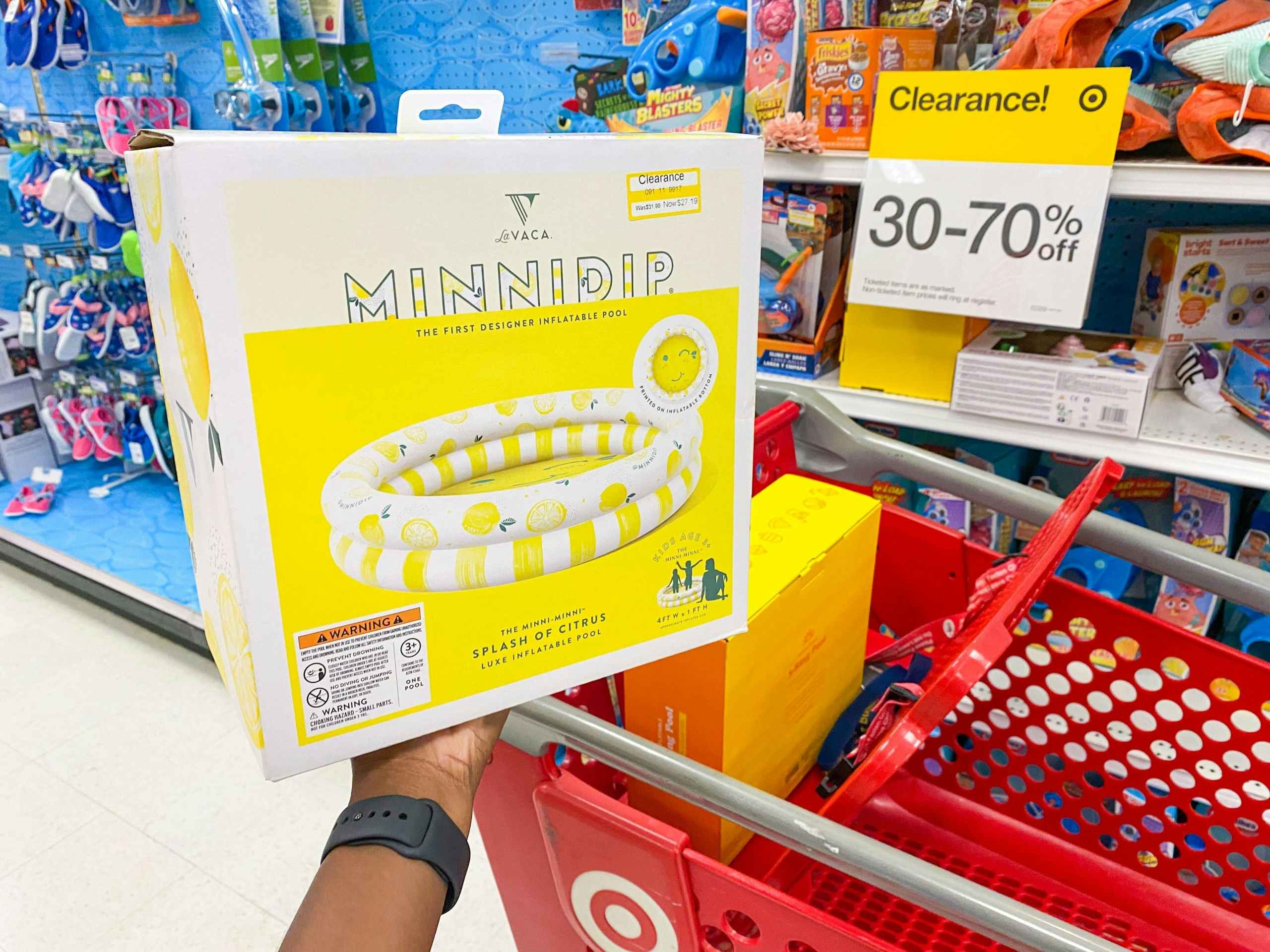 lemon three ring pool in front of sale sign and target cart