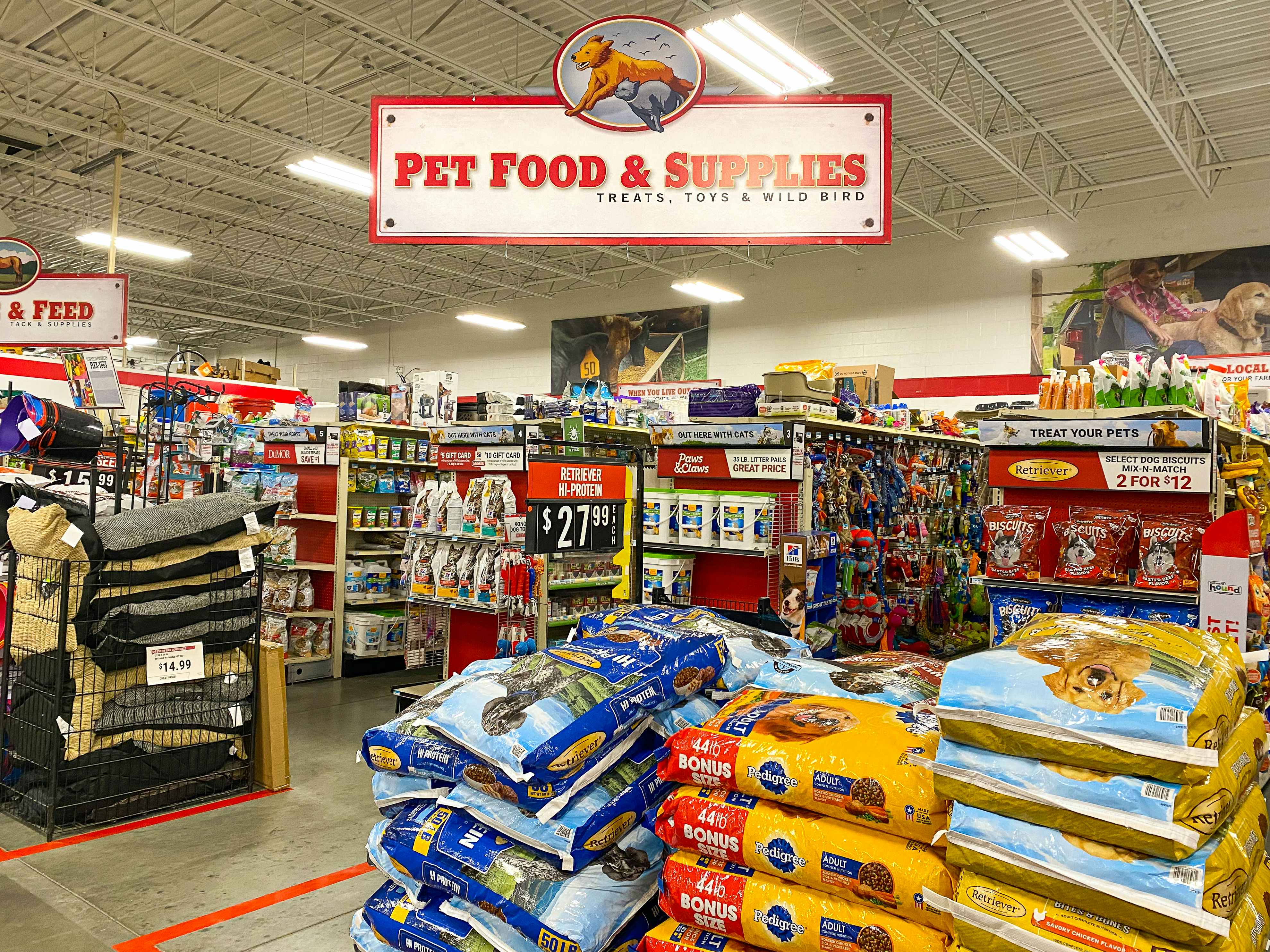 The Pet Food and Supplies section with a large sign.