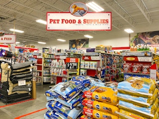 The Pet Food and Supplies section with a large sign.