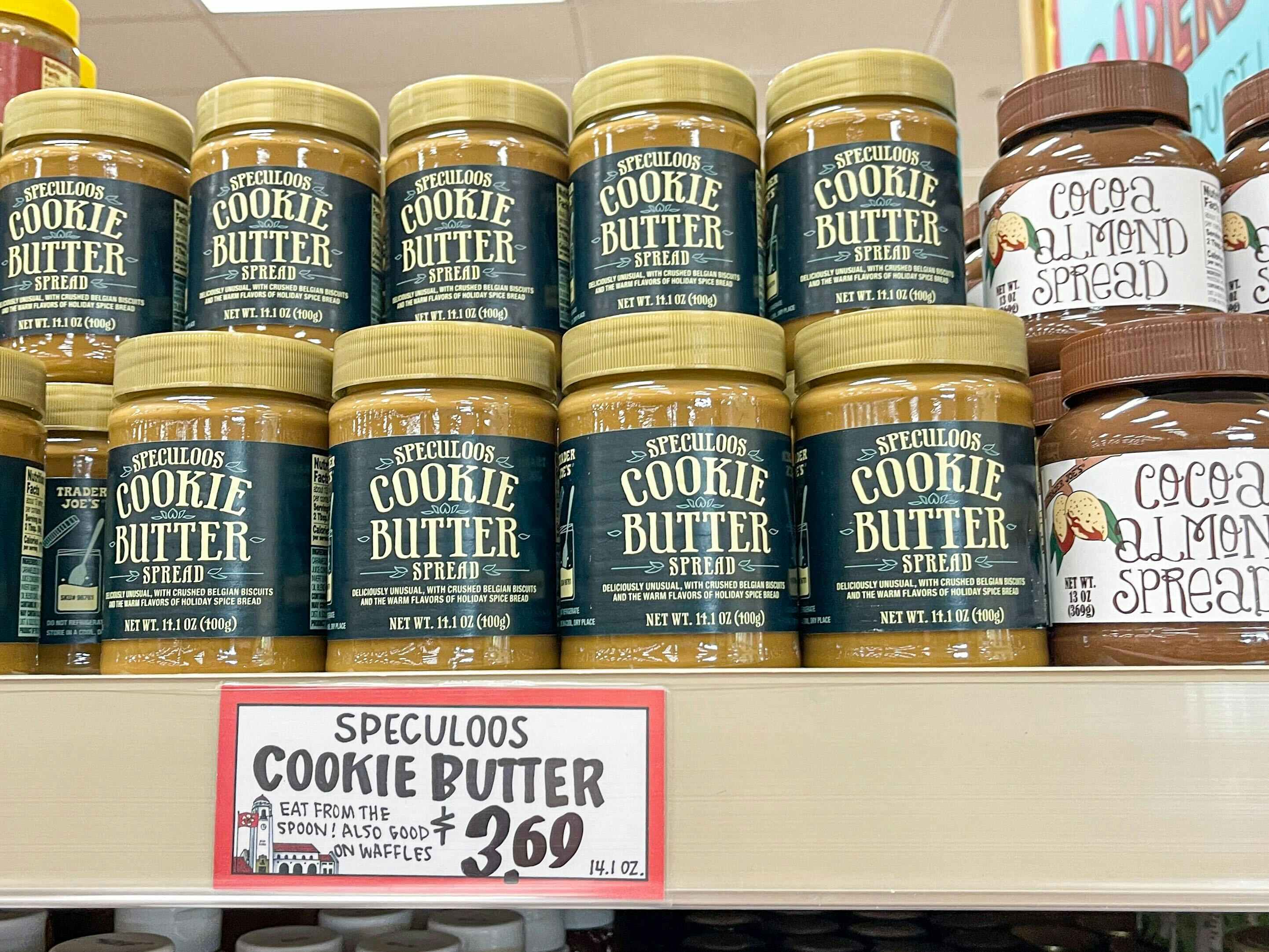 Trader Joe's Speculoos Cookie Butter stocked on a shelf at Trader Joe's.