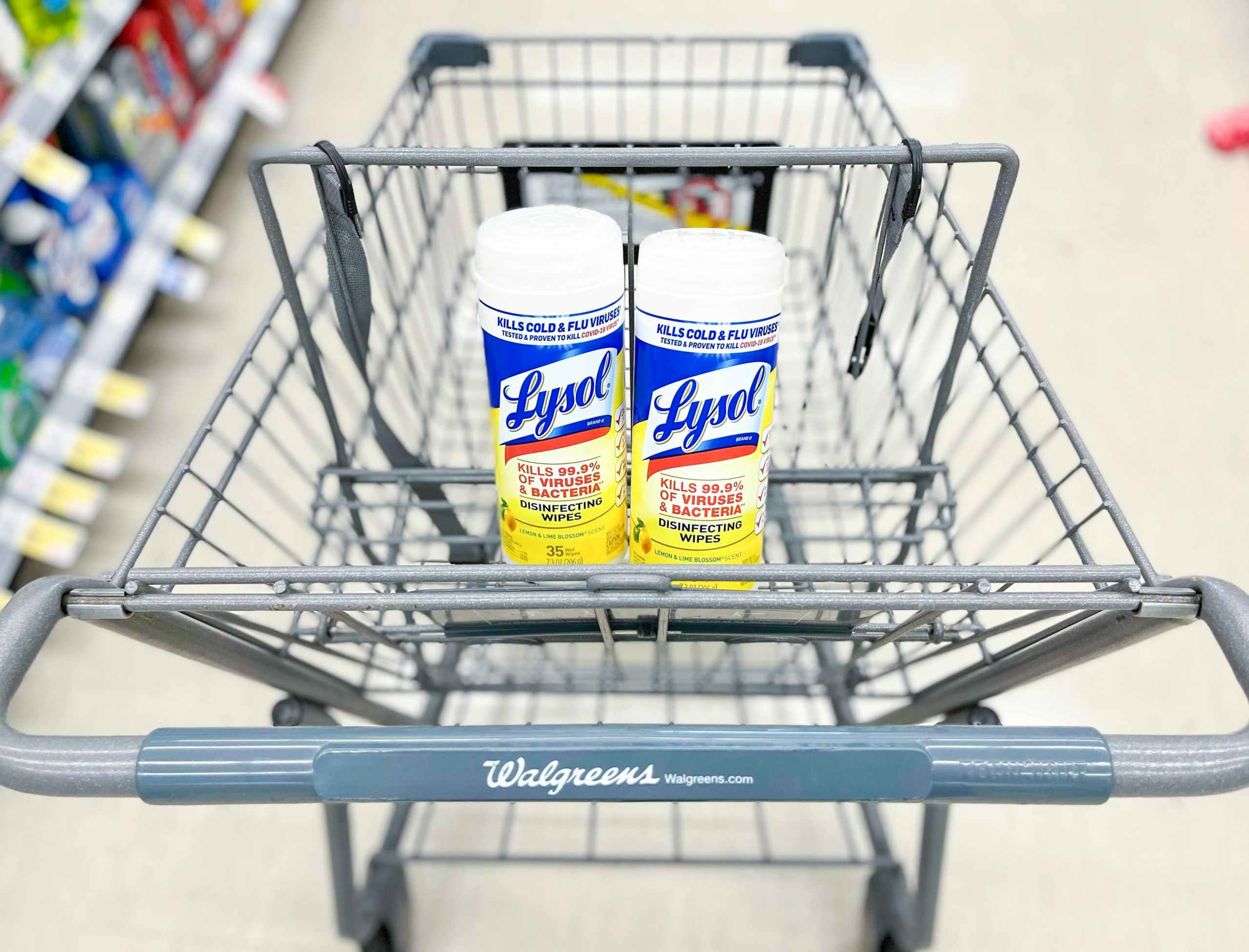 shopping cart with two containers of Lysol disinfecting wipes inside