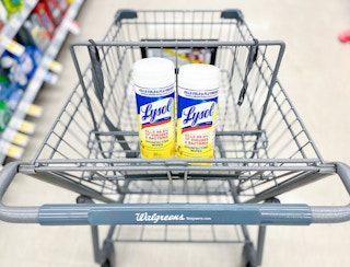 shopping cart with two containers of Lysol disinfecting wipes inside