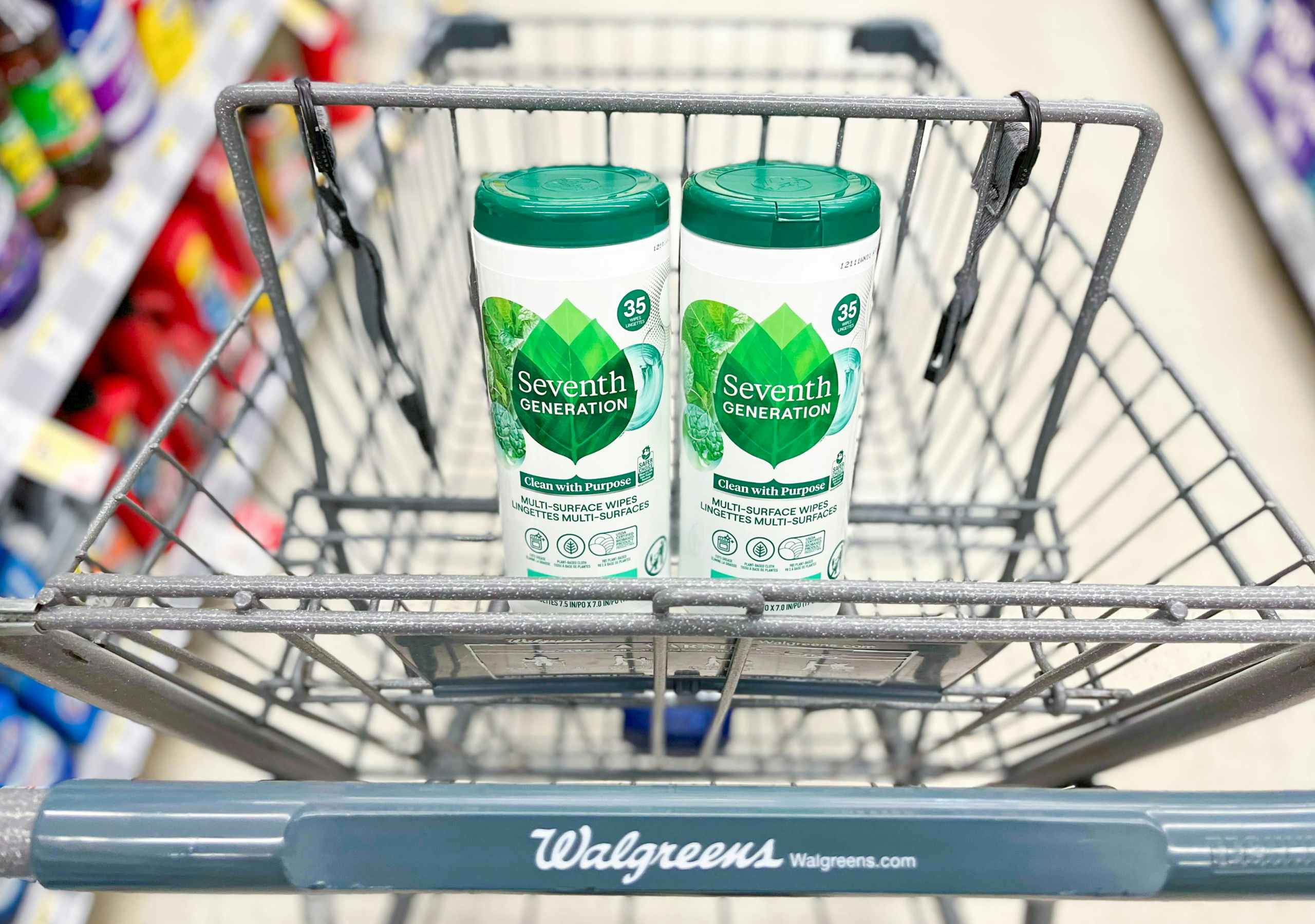shopping cart with two containers of Seventh Generation Multi Surface Wipes inside