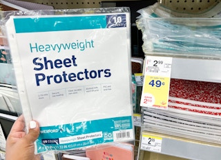 hand holding Wexford heavyweight sheet protectors next to sales tag