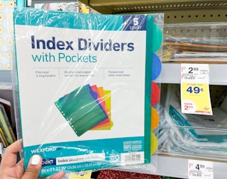 hand holding Wexford index dividers with pockets next to sales tag