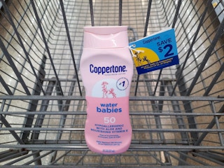 Coppertone Water Babies Sunscreen product in Walmart shopping cart. A $2 hangtag coupon is attached to the product.