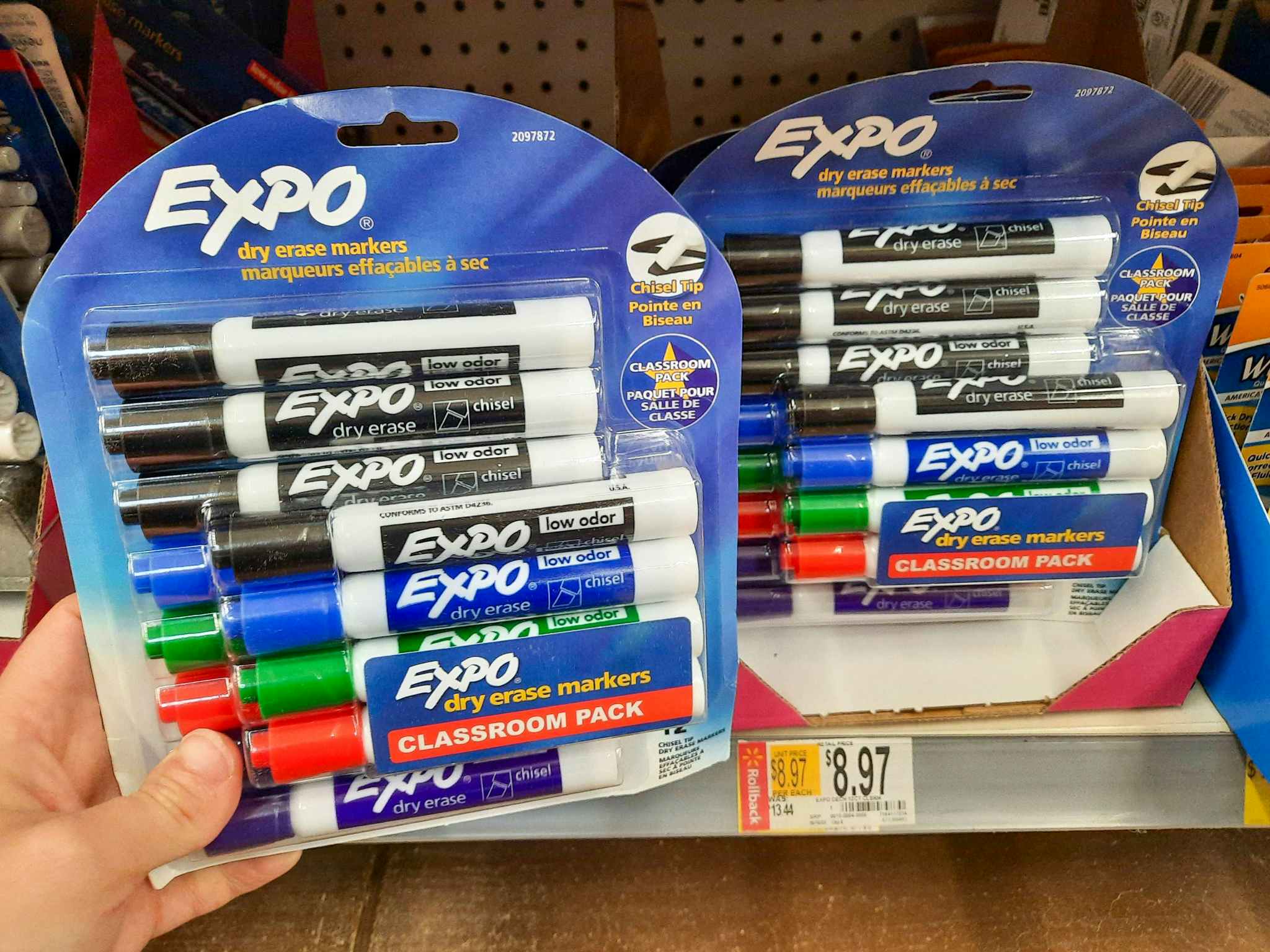 hand holding 12 pack of expo markers at walmart