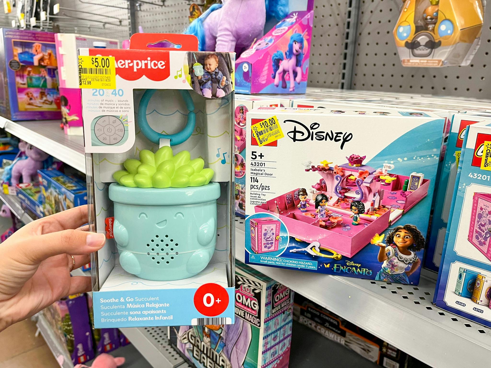 hand holding fisher price soothe and go succulent at walmart