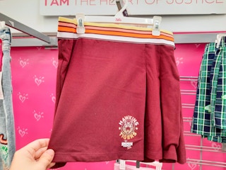 hand holding justice stranger things knit skirt at walmart