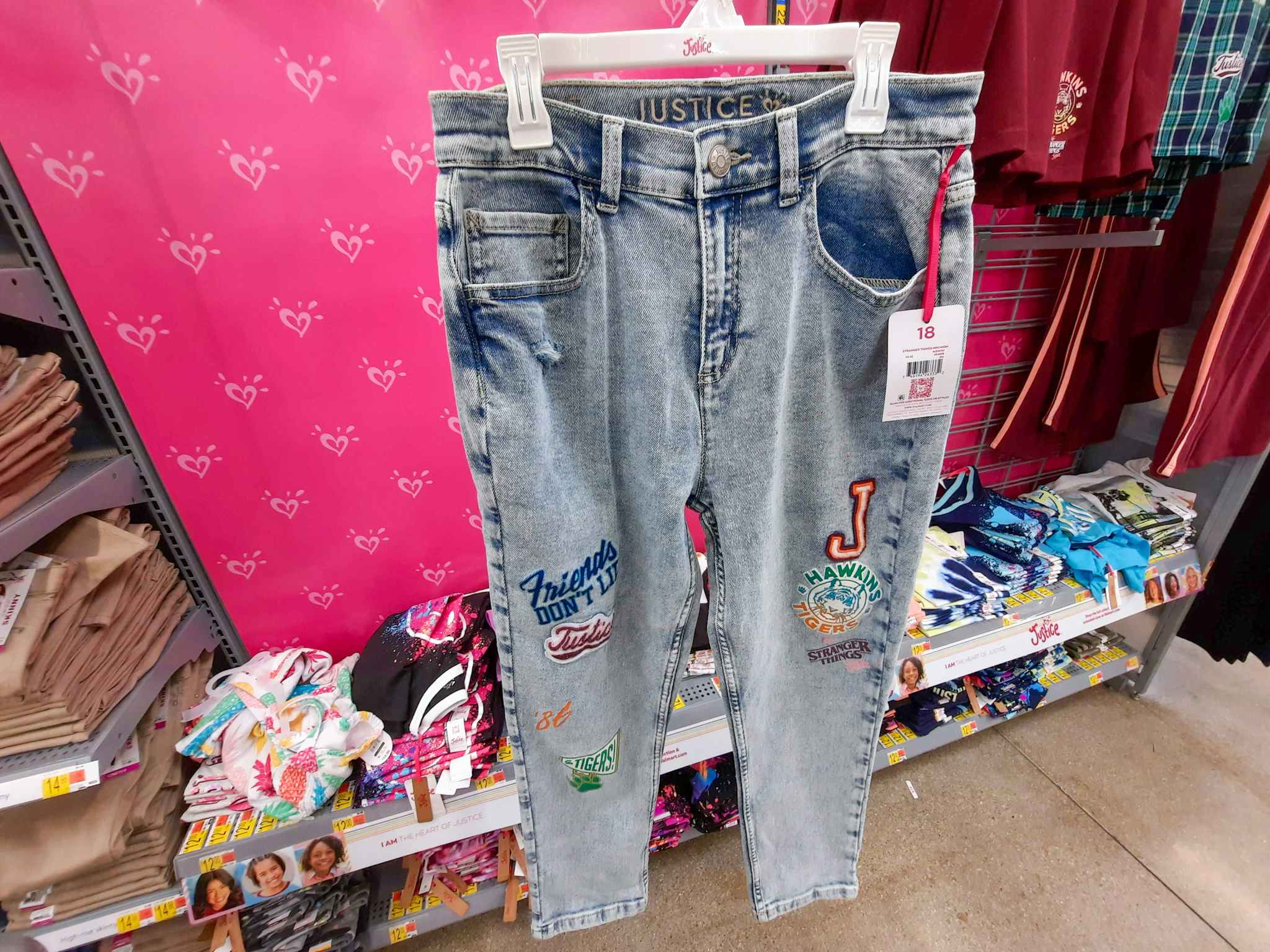 hand holding justice stranger things mom jeans at walmart